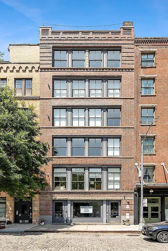 32 Laight Street, Unit 5 Manhattan, NY 10013 - Photo 30 of 31 a front view of a building with a street