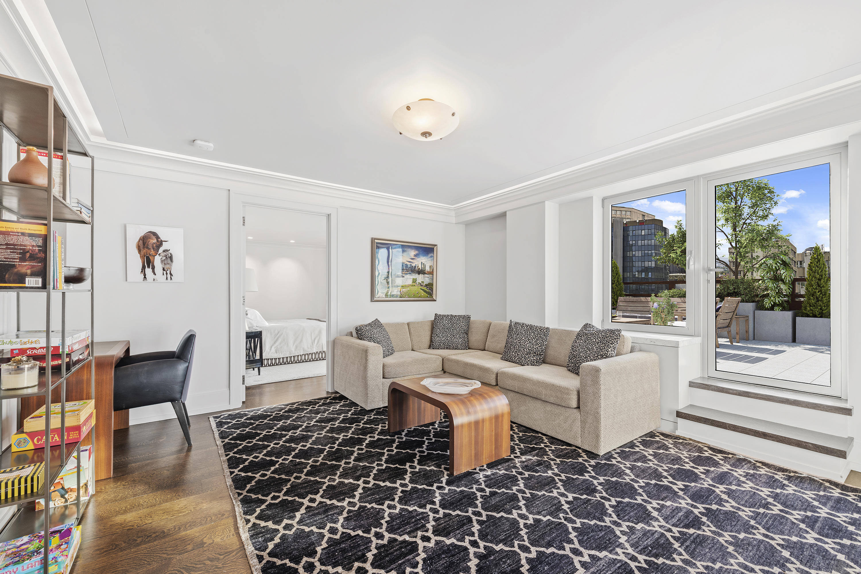 180 East End Avenue, Unit 15E Manhattan, NY 10128 - Photo 14 of 31 a living room with furniture and a rug