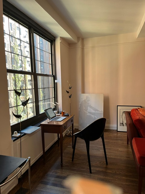 435 West 23rd Street, Unit 7B Manhattan, NY 10011 - Photo 7 of 23 a room with furniture and window