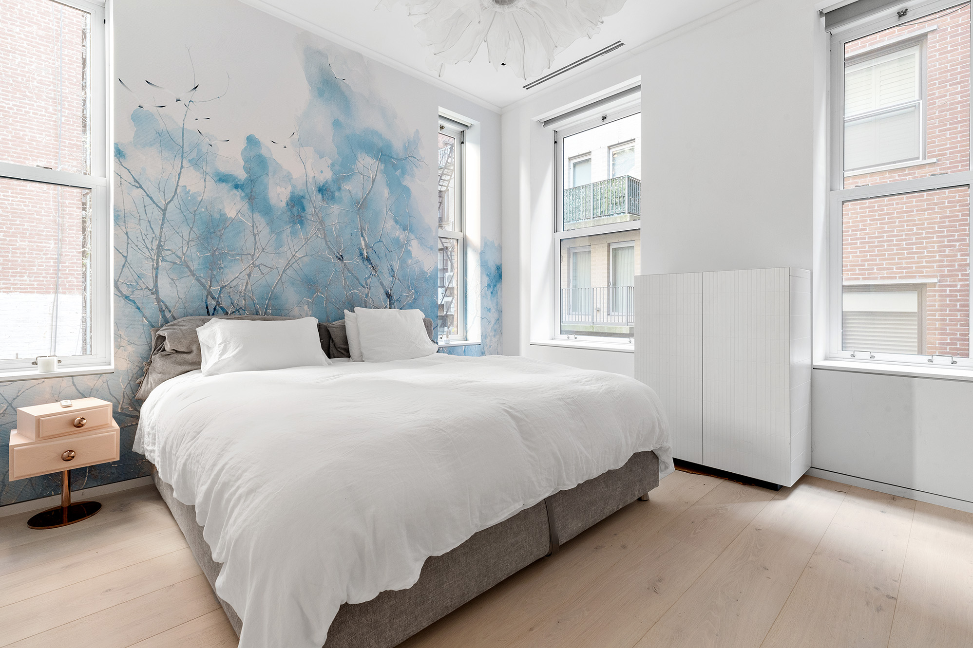 26 West 20th Street, Unit 3 Manhattan, NY 10011 - Photo 8 of 19 a bedroom with a bed and a window