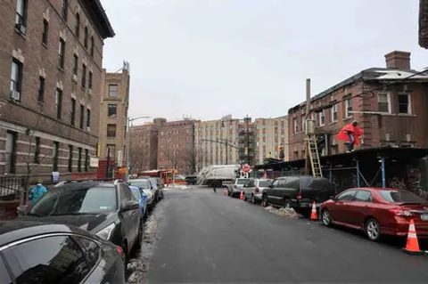 a cars parked in front of a building