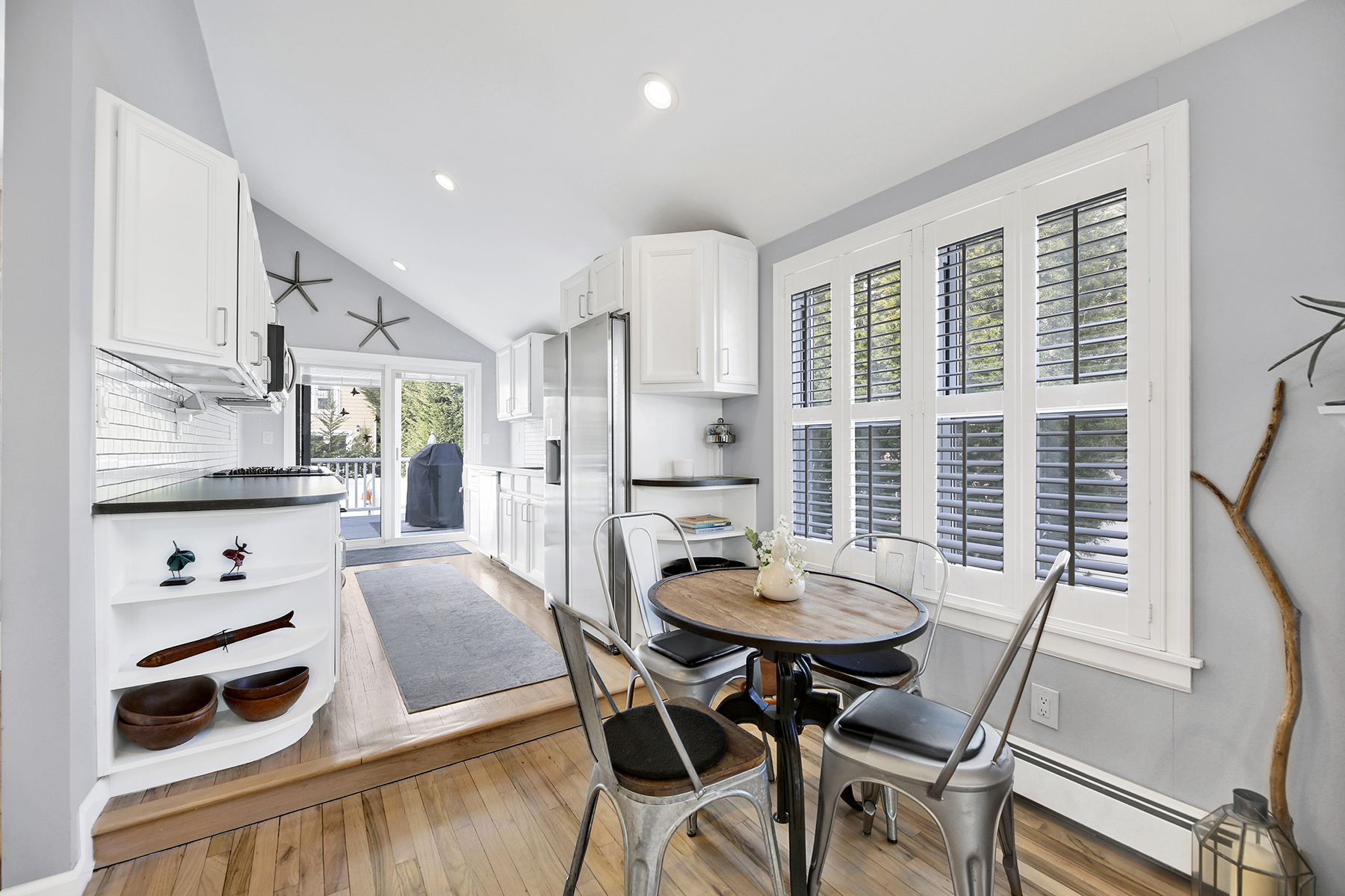 4-53 Beach 142nd Street Queens, NY 11694 - Photo 13 of 39 a view of a dining room with furniture and wooden floor