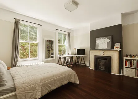 a bathroom with a bathtub sink and toilet