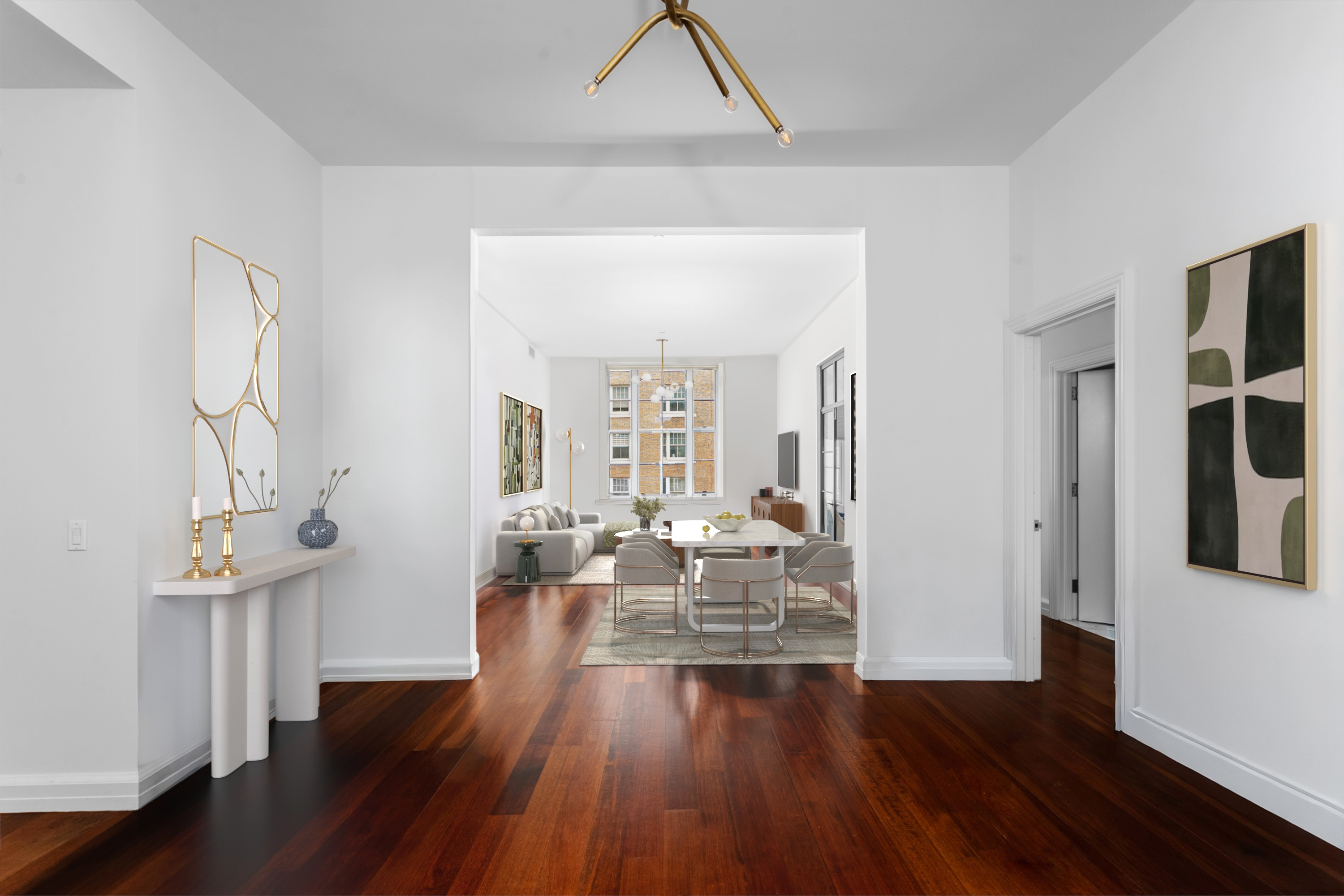 2112 Broadway, Unit 5F Manhattan, NY 10023 - Photo 3 of 9 a view of a livingroom with furniture wooden floor and windows
