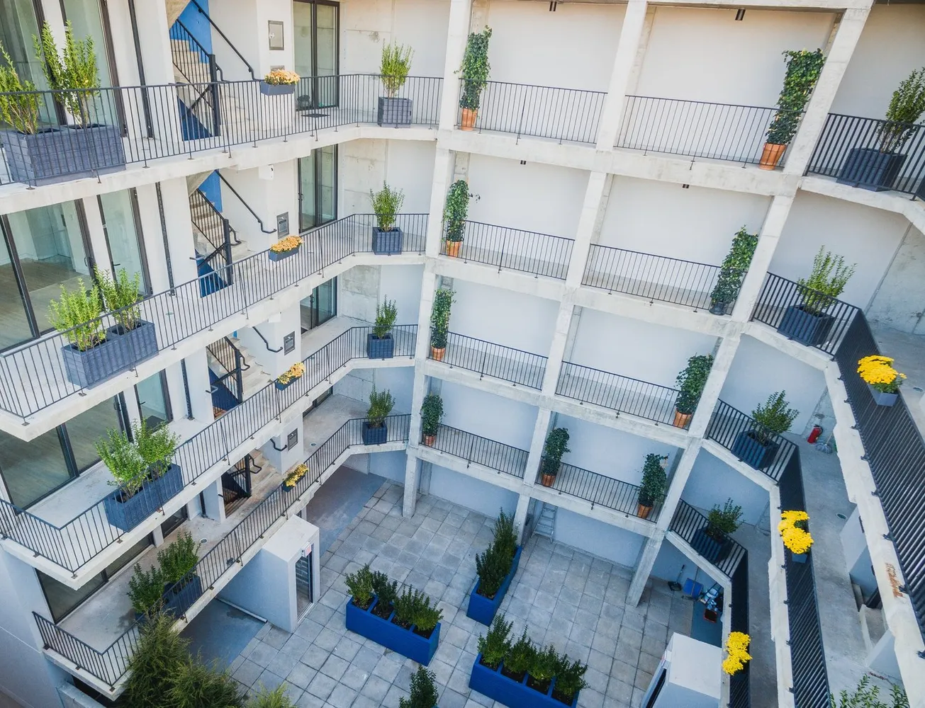 a view of balcony with outdoor seating and city view