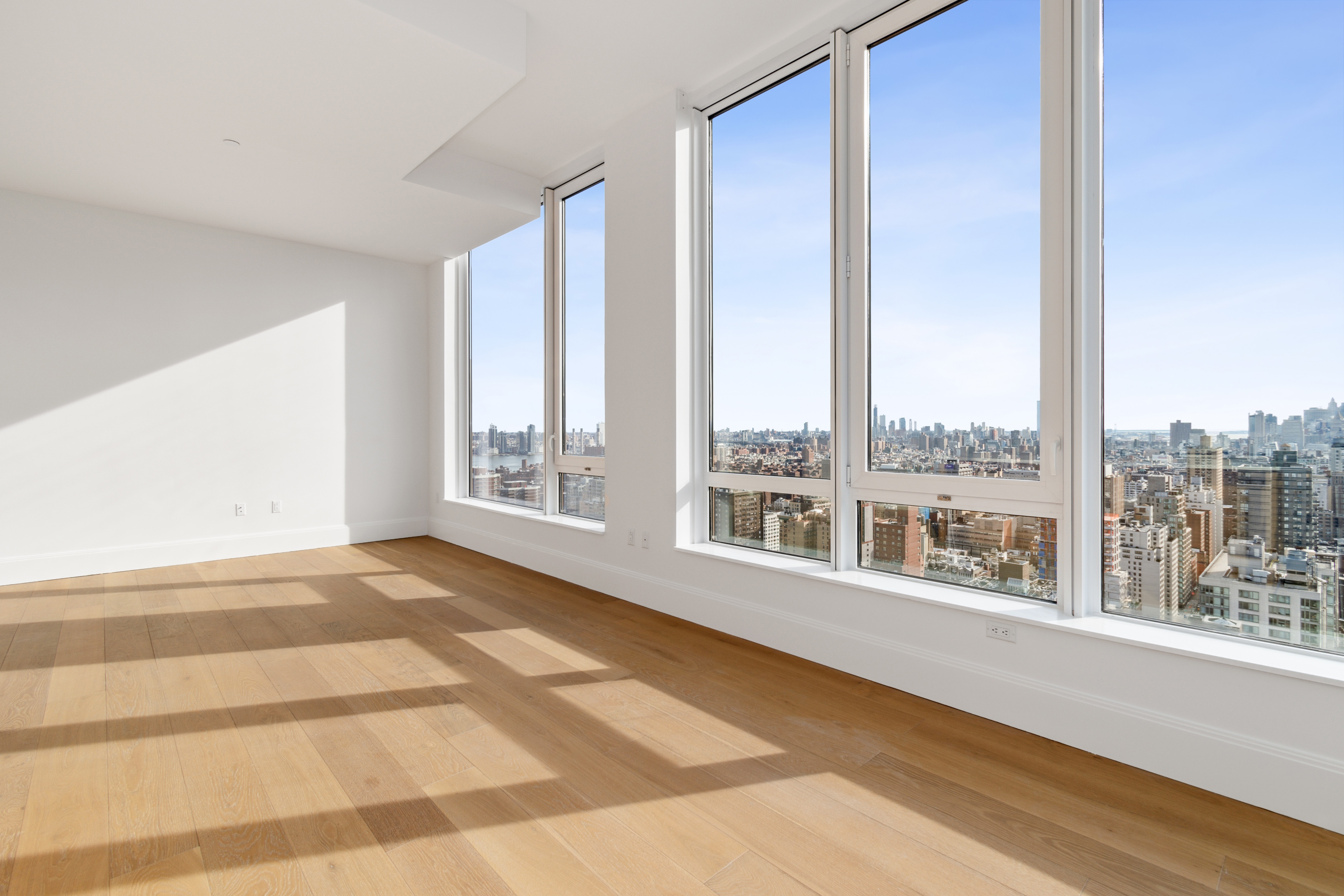 368 3rd Avenue, Unit 32B Manhattan, NY 10016 - Photo 10 of 19 a view of an empty room with a window