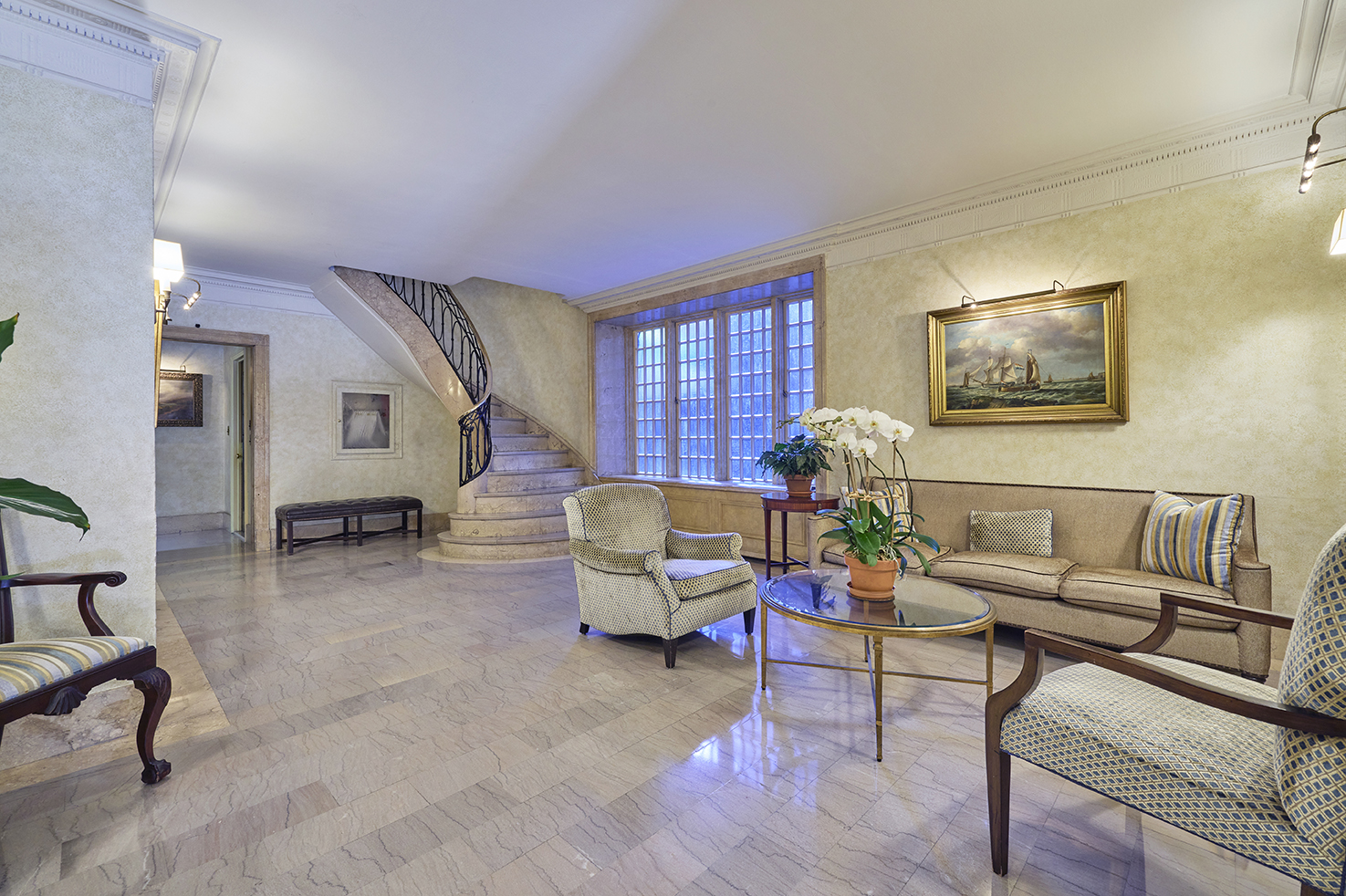 161 East 79th Street, Unit 7B Manhattan, NY 10075 - Photo 13 of 15 a living room with furniture and a window