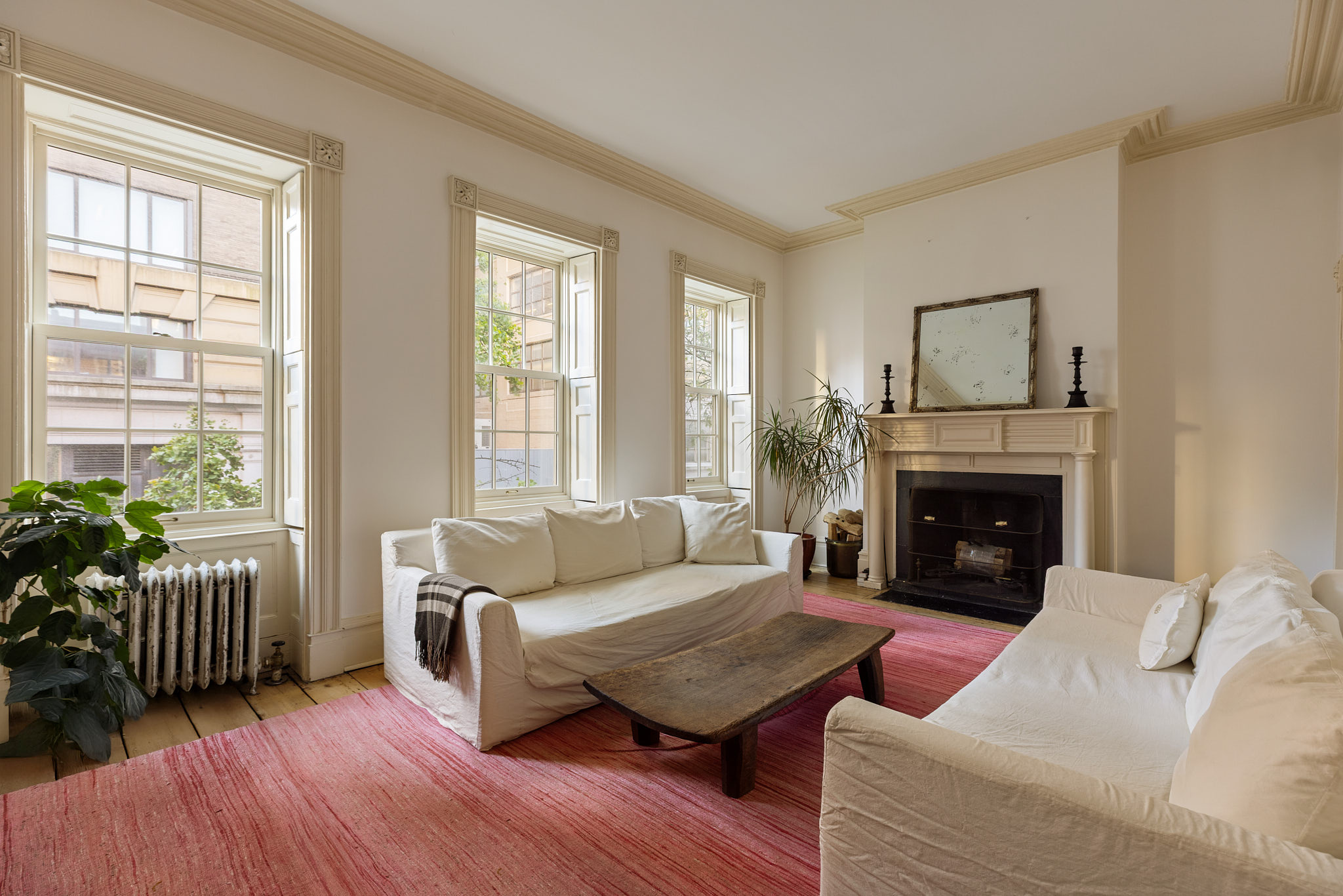 13 Vandam Street Manhattan, NY 10014 - Photo 14 of 26 a living room with furniture and a fireplace