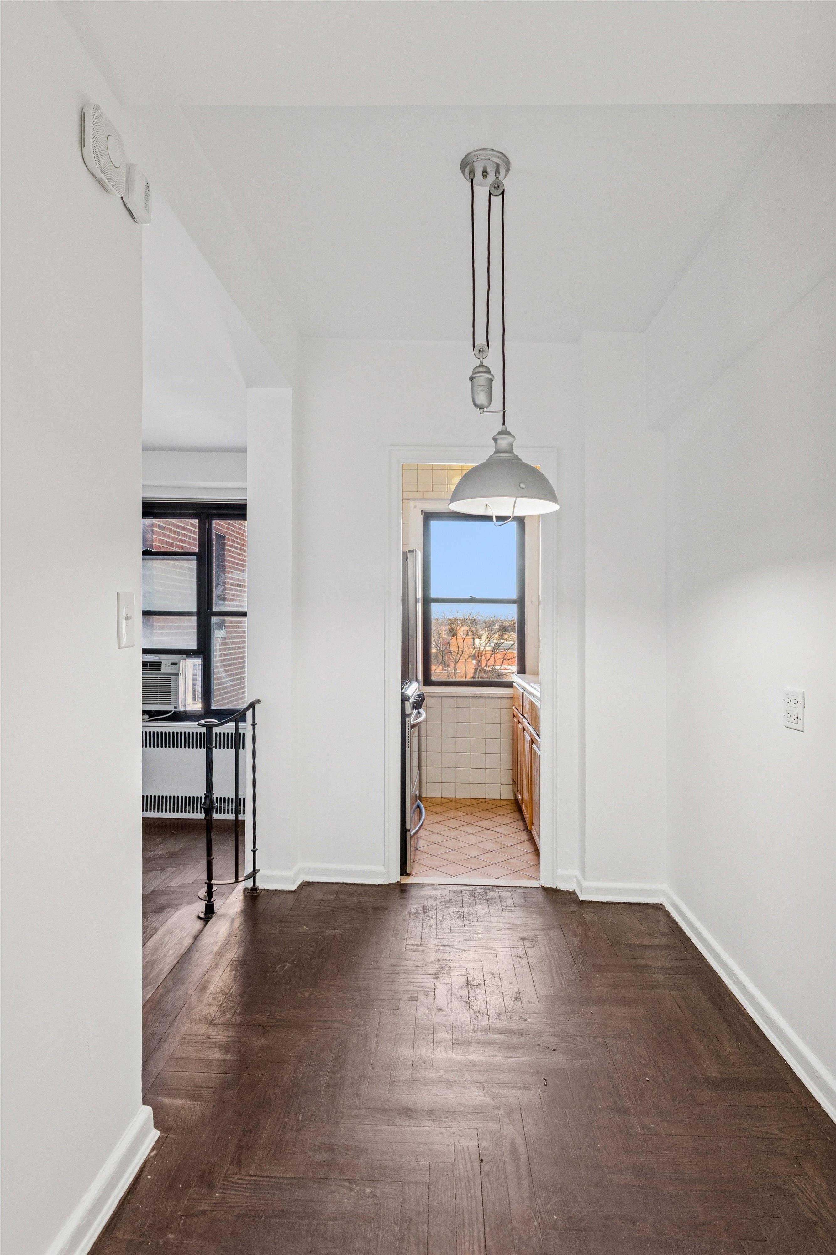 70 Park Terrace West, Unit E74 Manhattan, NY 10034 - Photo 9 of 27 a view of empty room with wooden floor