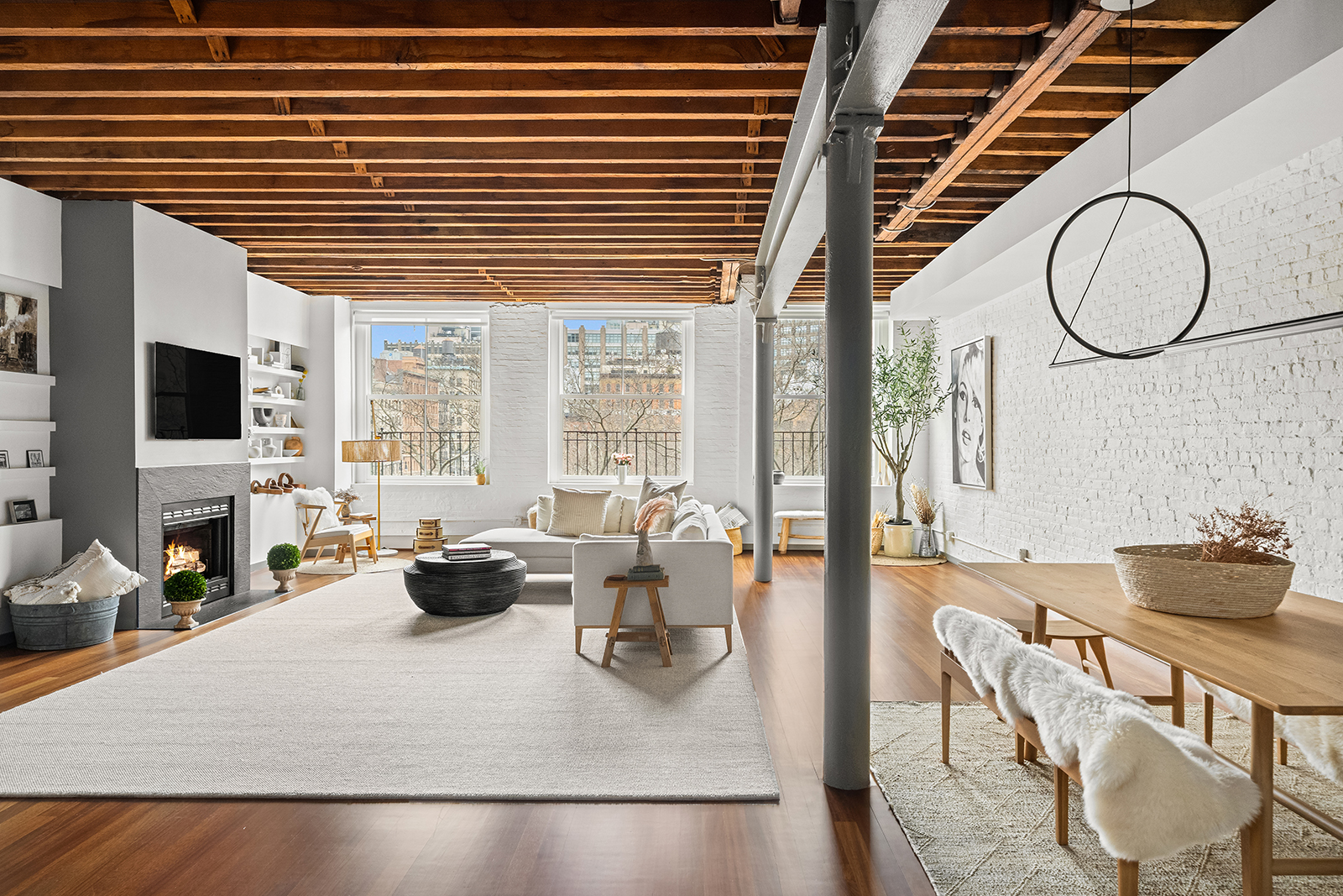 39 North Moore Street, Unit 4A Manhattan, NY 10013 - Photo 4 of 17 a dining room with furniture and a large window