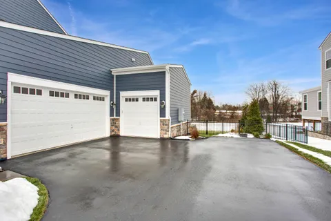 a front view of a house with a lots of windows