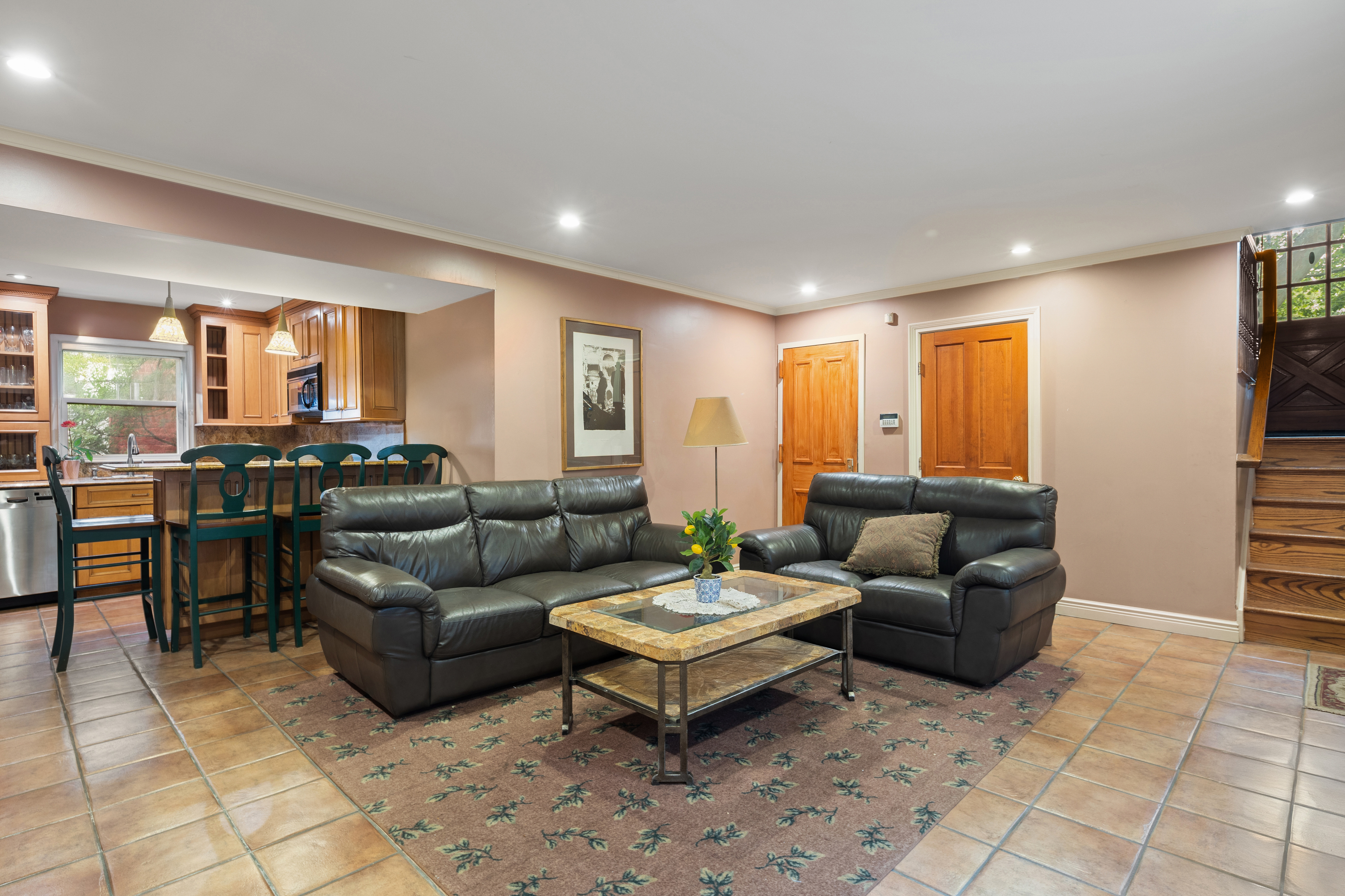 110 82nd Street Brooklyn, NY 11209 - Photo 13 of 28 a living room with furniture and a large window