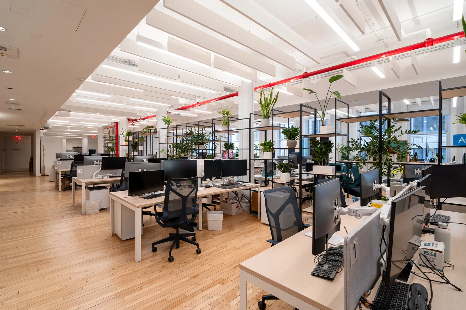 a room with lots of furniture and view kitchen