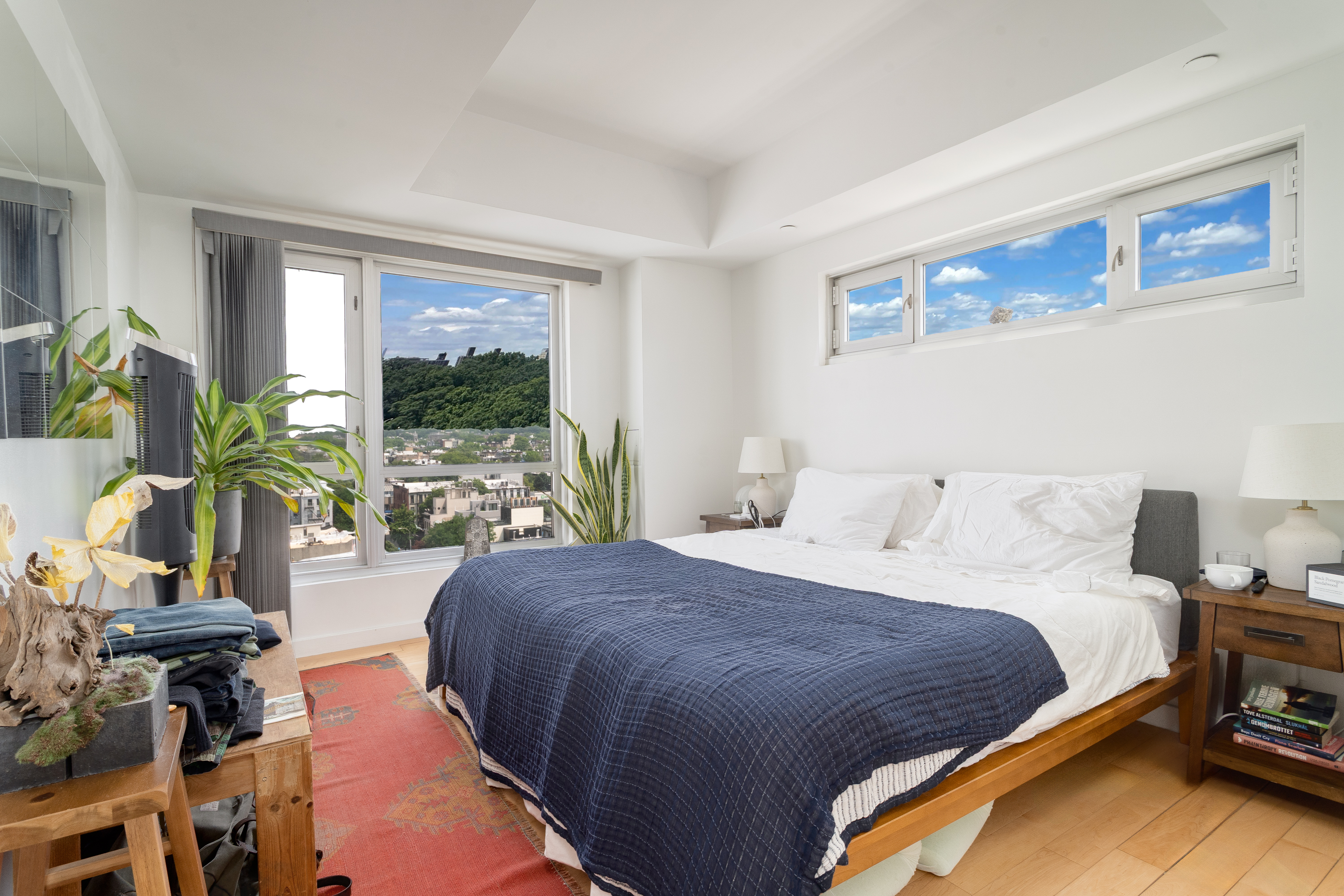 560 Carroll Street, Unit 11A Brooklyn, NY 11215 - Photo 9 of 15 a bedroom with a bed and wooden floor