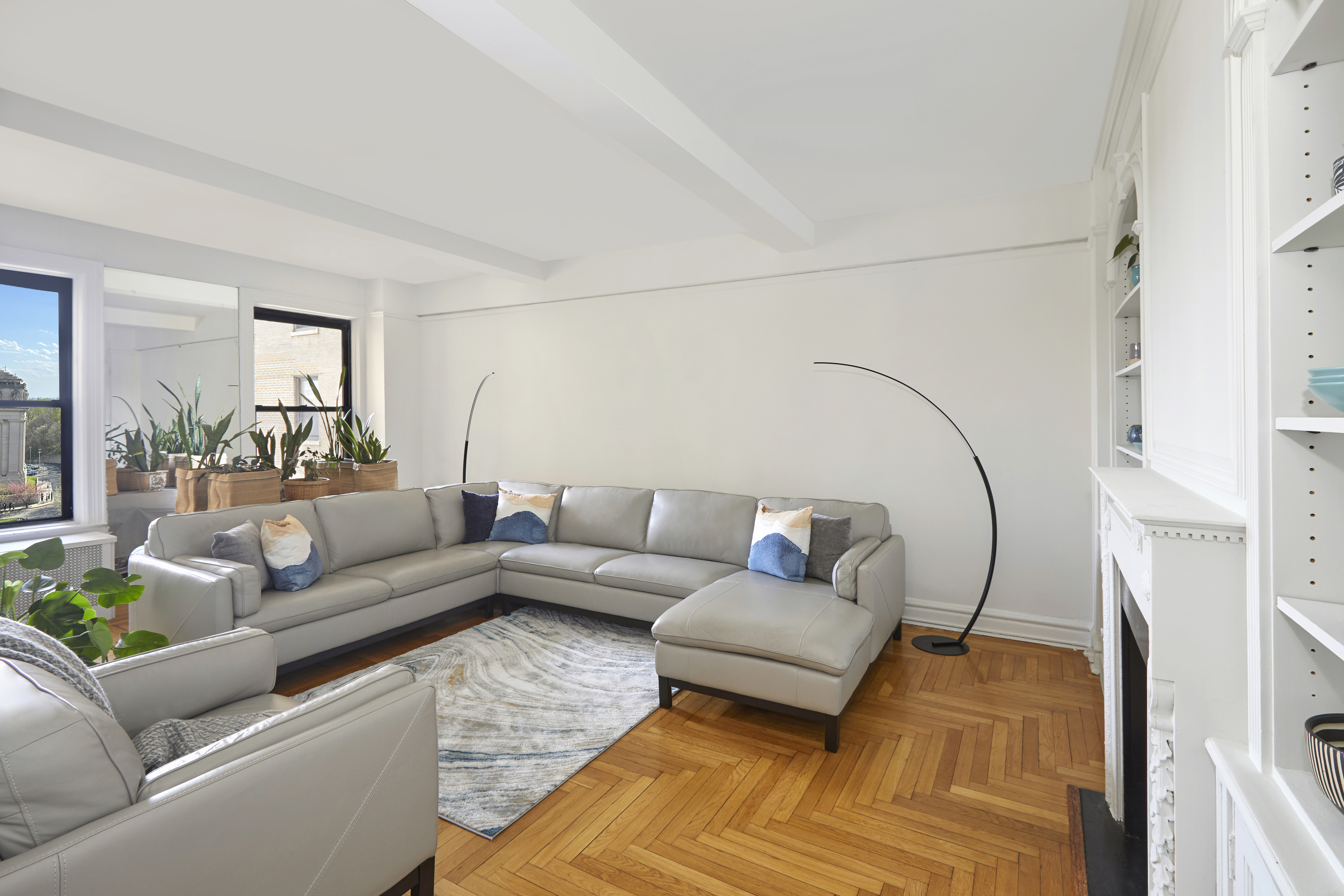 135 Eastern Parkway, Unit 9I Brooklyn, NY 11238 - Photo 7 of 17 a living room with furniture and a couch