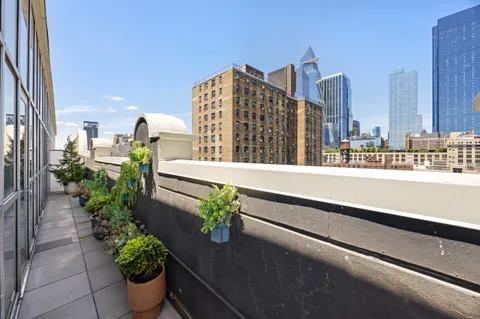 a view of a city with tall buildings