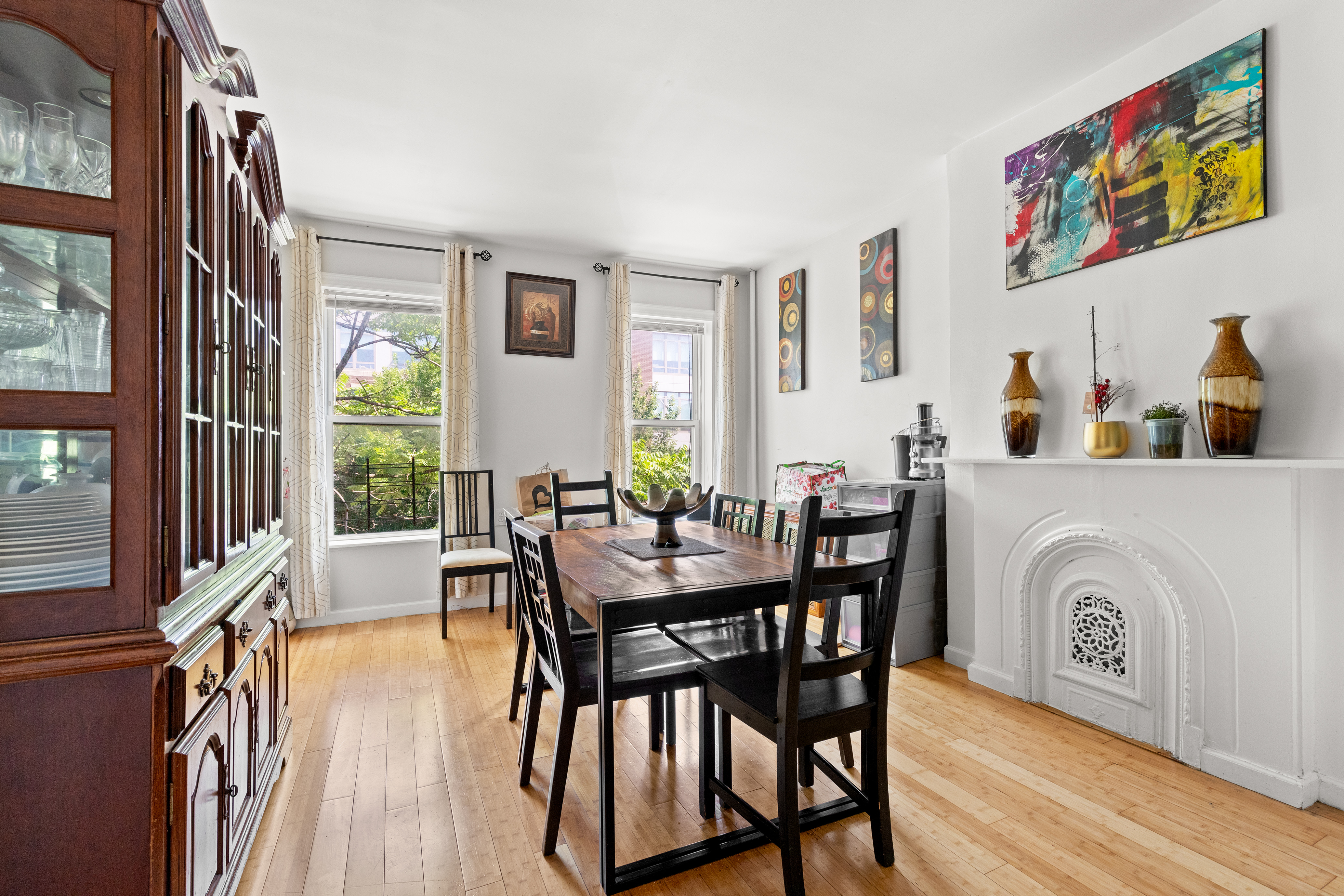 300 Gates Avenue Brooklyn, NY 11216 - Photo 2 of 13 a view of a dining room with furniture window and wooden floor