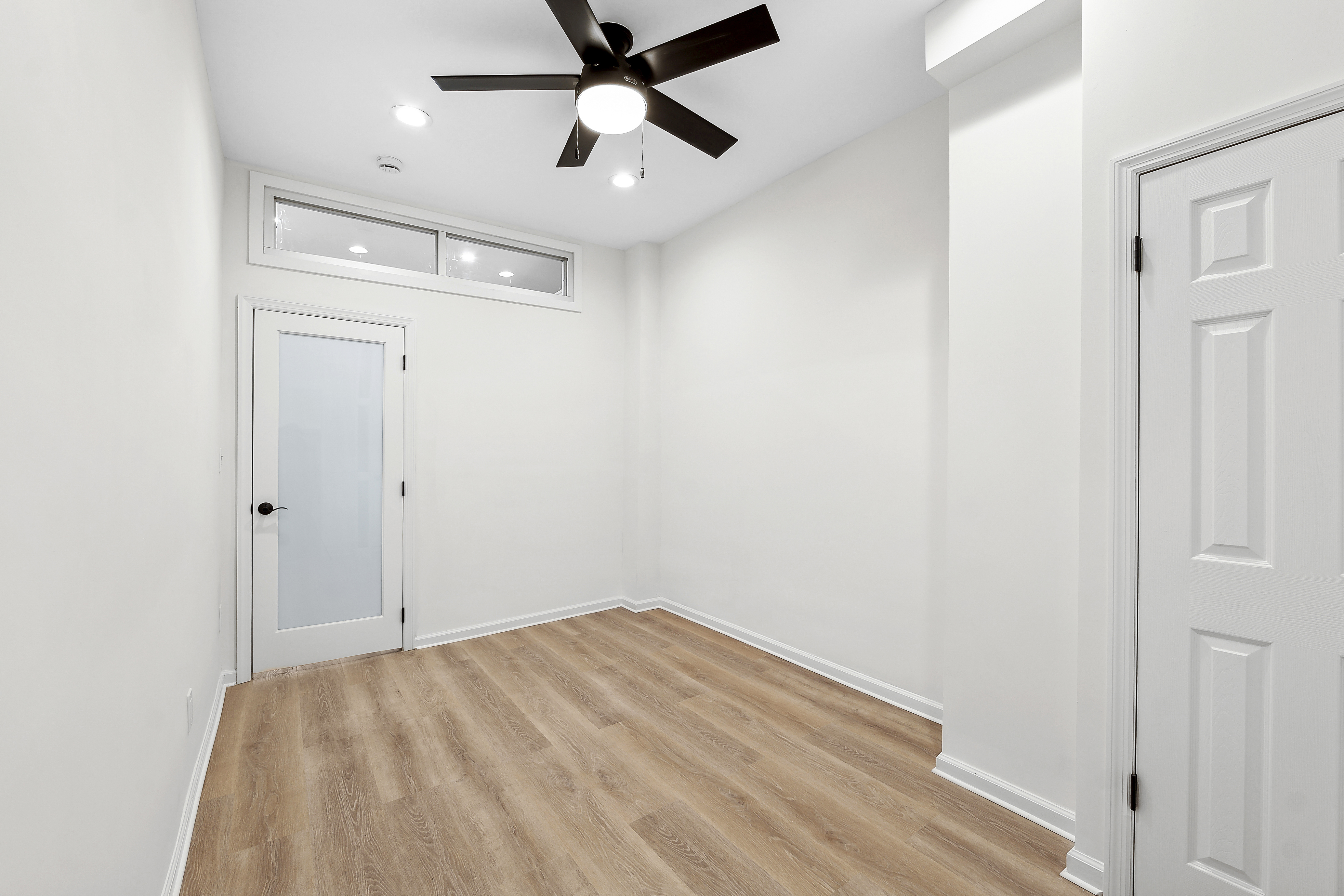 398 3rd Avenue, Unit 4B Manhattan, NY 10016 - Photo 6 of 10 a view of empty room with wooden floor