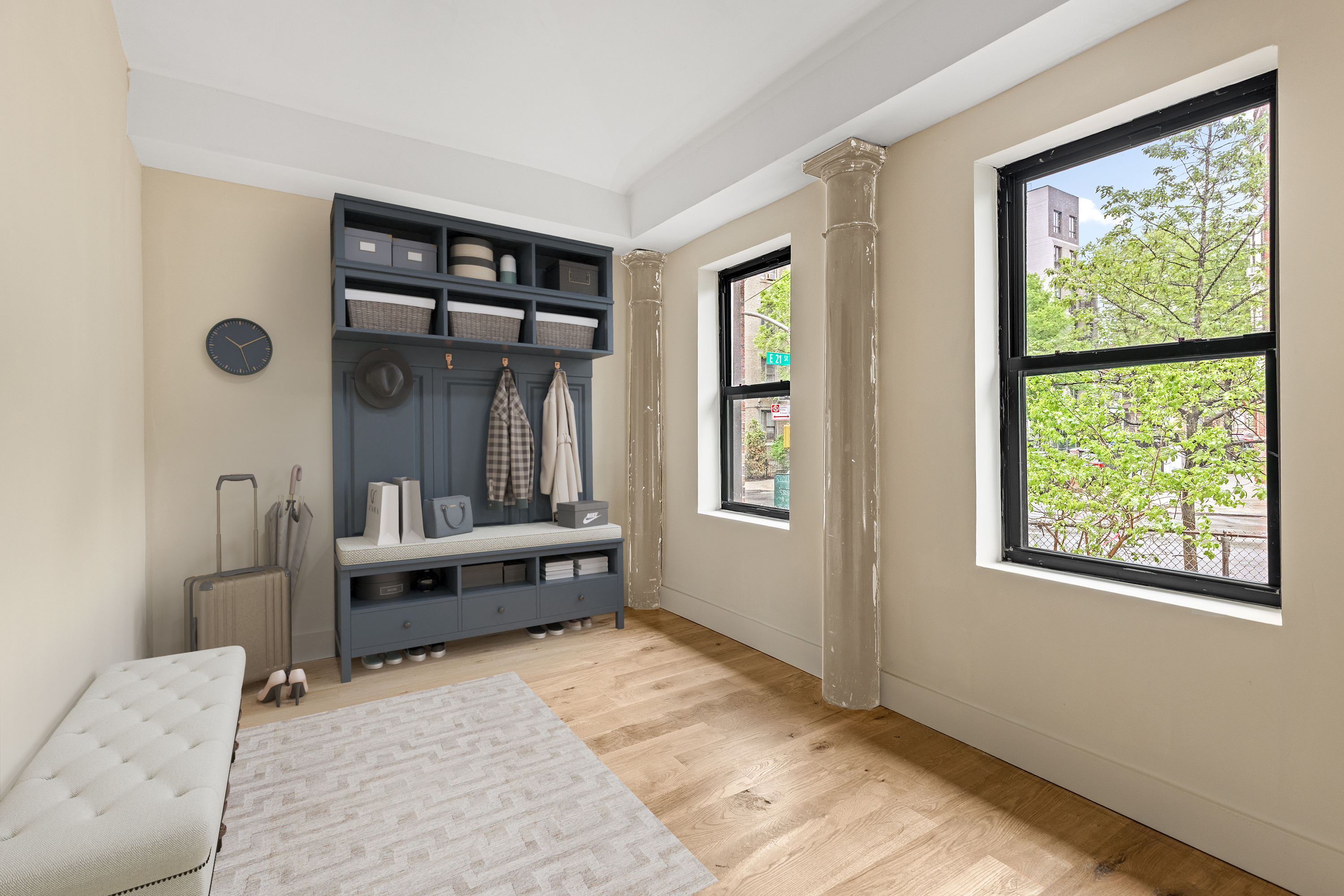 695 East 21st Street Brooklyn, NY 11210 - Photo 18 of 24 a living room with furniture and a window