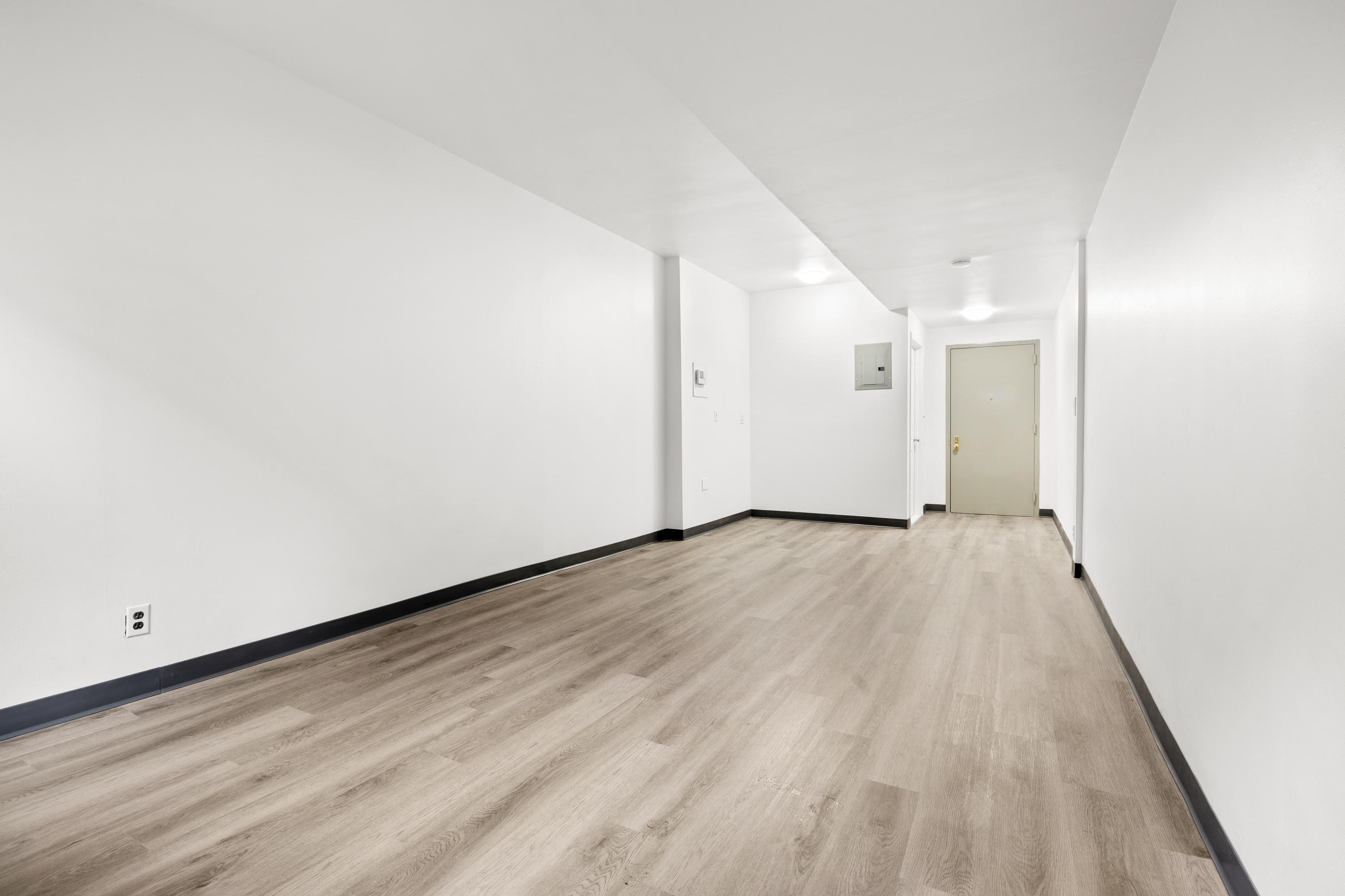 343 East 76th Street, Unit ABC Manhattan, NY 10021 - Photo 6 of 9 a view of a room with wooden floor