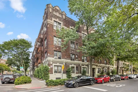 a car parked in front of a building