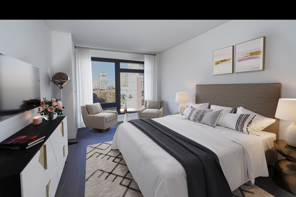613 Baltic Street, Unit 6C Brooklyn, NY 11217 - Photo 3 of 9 a bed room with a bed and a couch