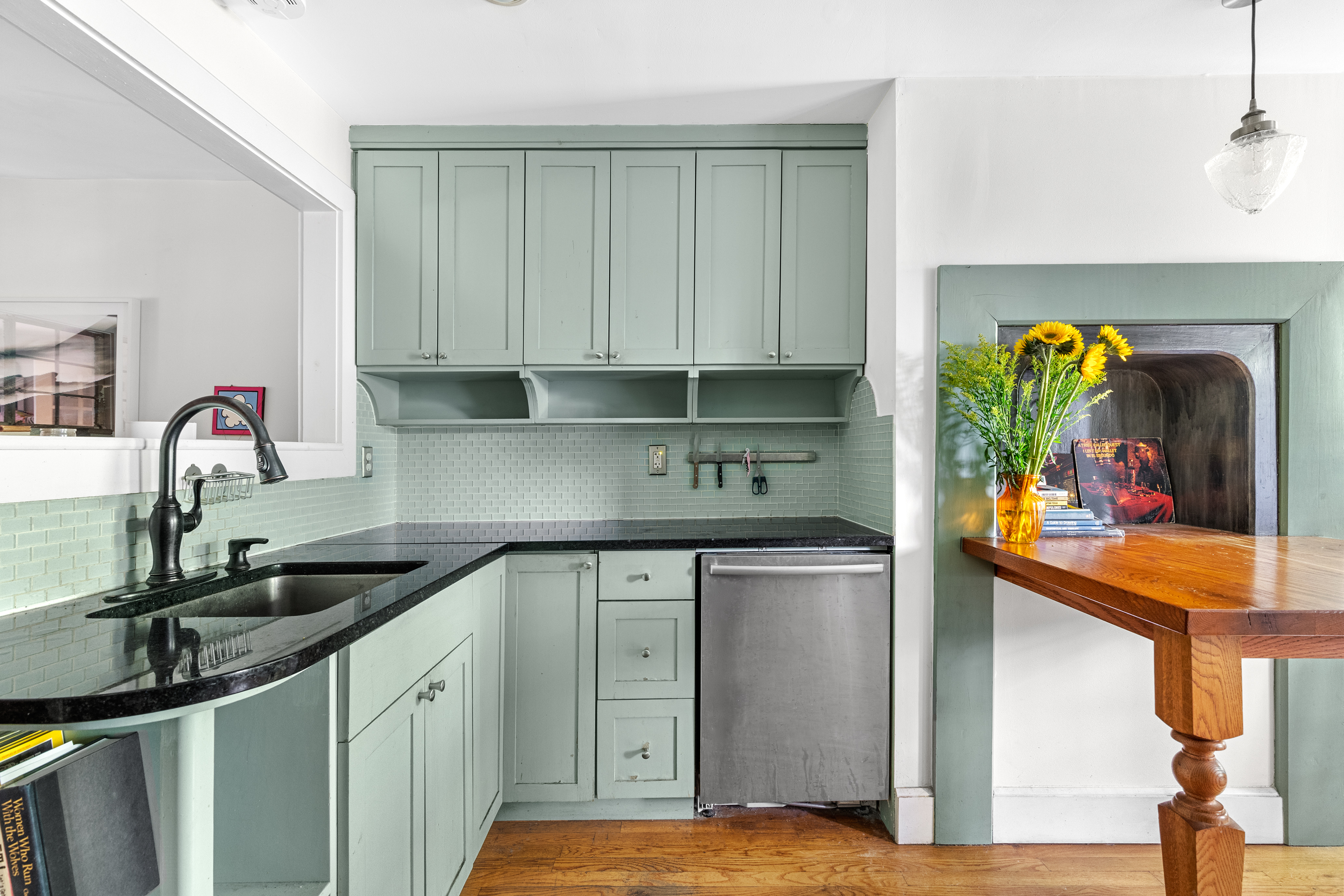955 Bushwick Avenue Brooklyn, NY 11221 - Photo 10 of 19 a kitchen with stainless steel appliances granite countertop a sink and cabinets