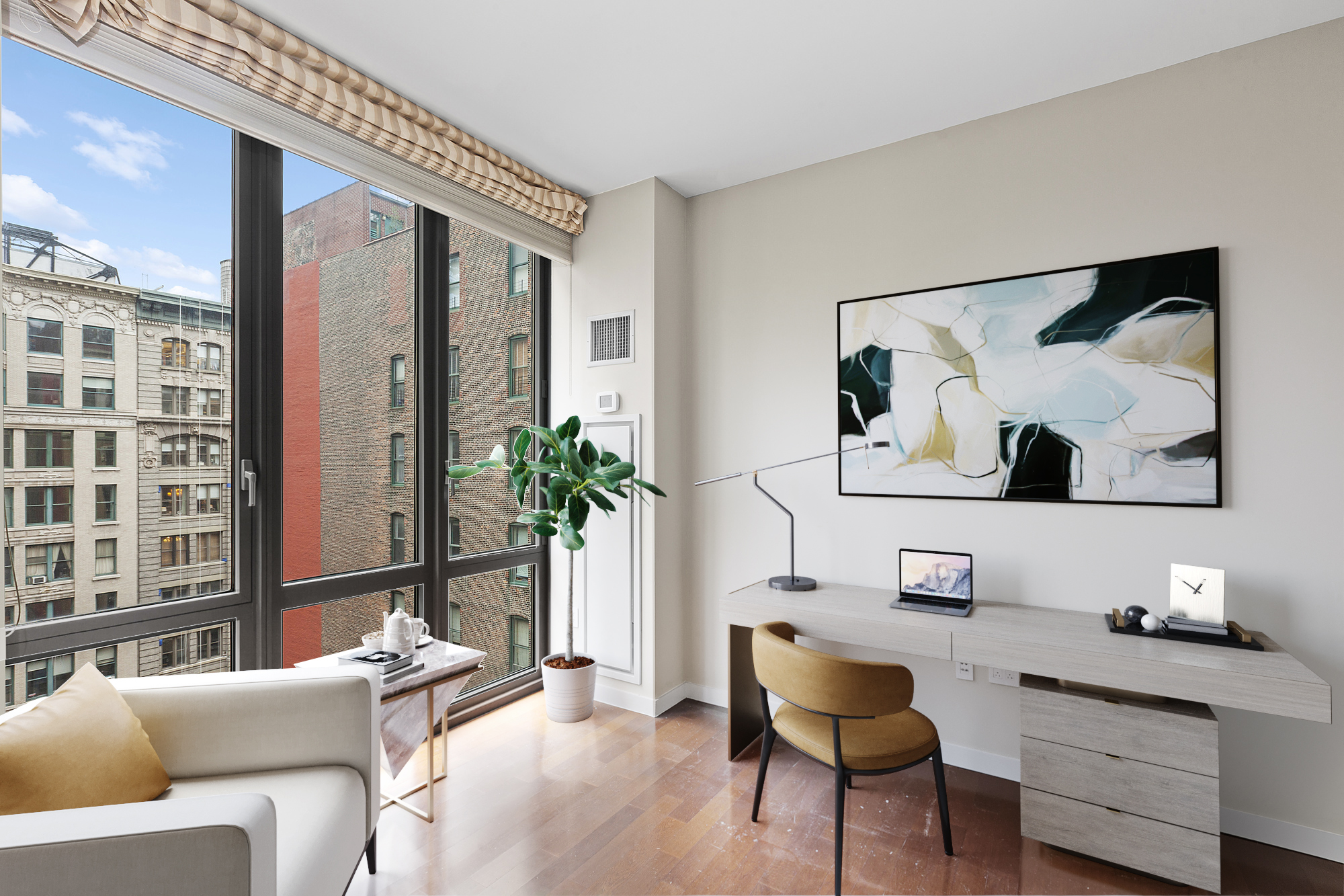 4 West 21st Street, Unit 11A Manhattan, NY 10010 - Photo 5 of 9 a living room with furniture and wooden floor