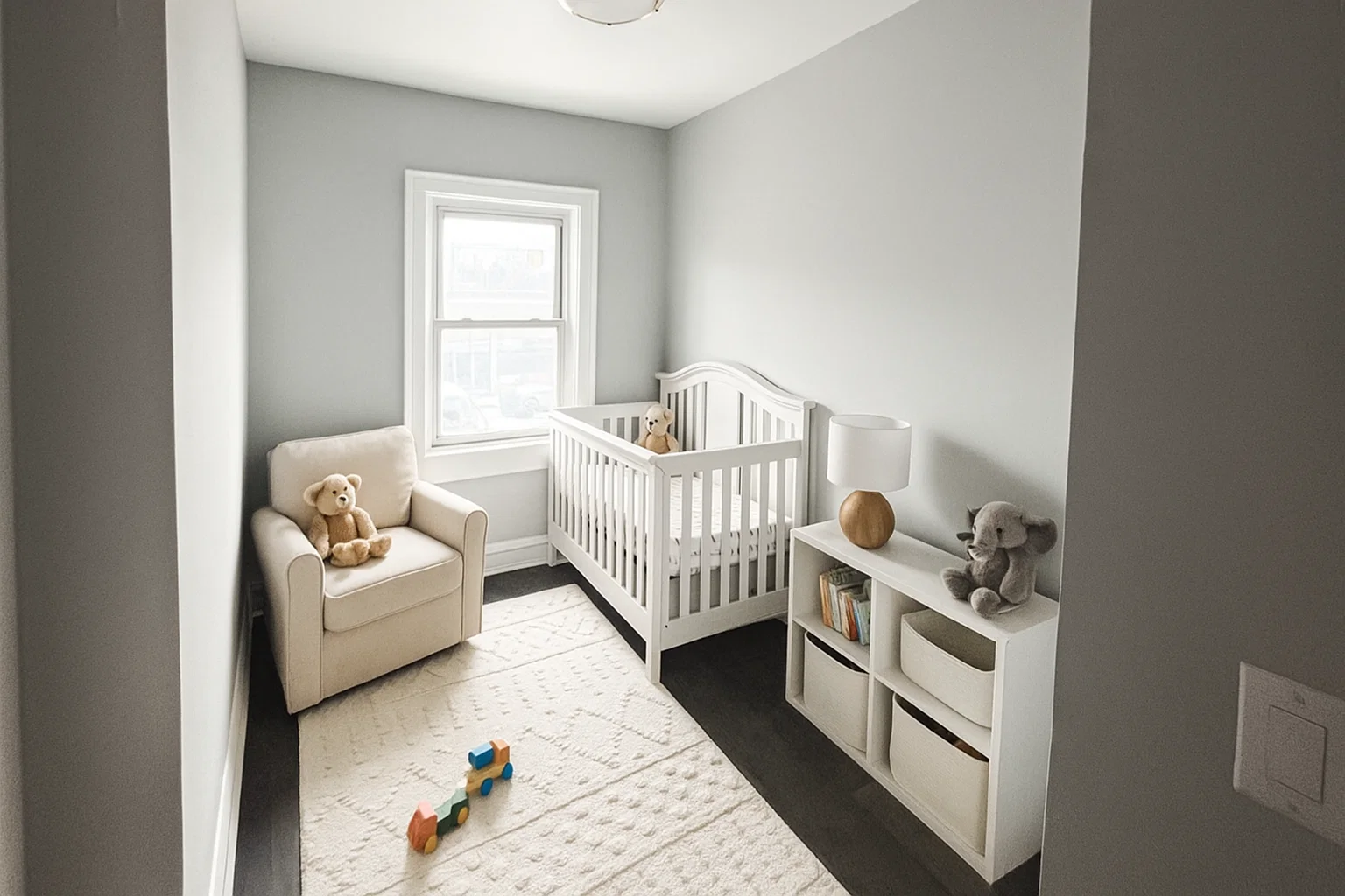 211-45 Jamaica Avenue, Unit 1 Queens, NY 11428 - Photo 2 of 4 a living room with furniture a baby crib furniture and a window