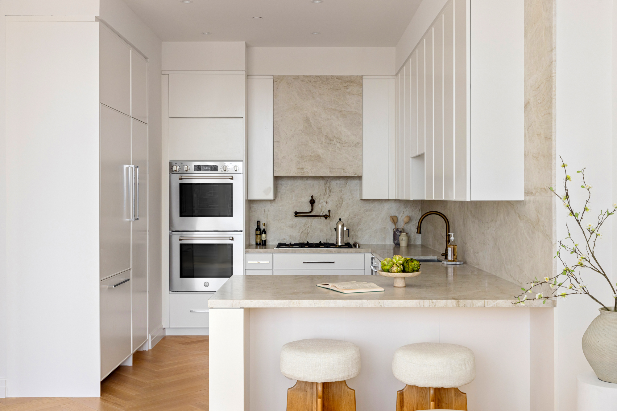 15 West 96th Street, Unit 19 Manhattan, NY 10025 - Photo 3 of 17 a kitchen with appliances a sink and cabinets