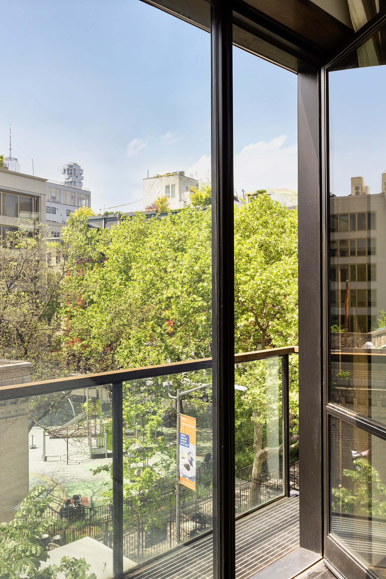 35 Spring Street Manhattan, NY 10012 - Photo 7 of 14 a view of a city from a window