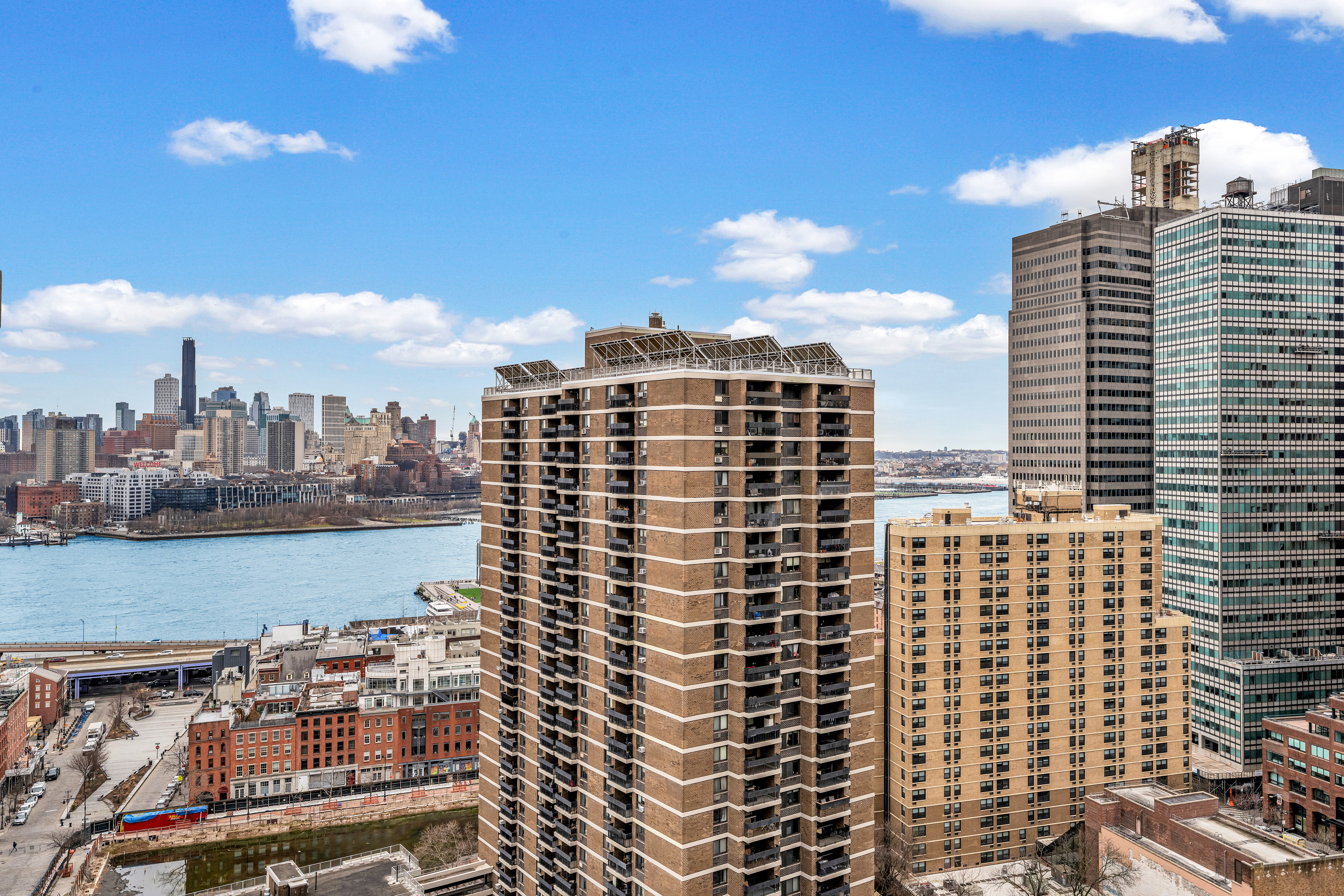 a view of a city with tall buildings