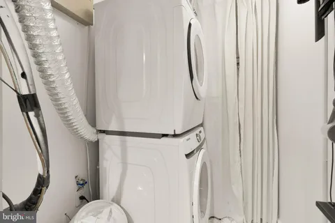 a bathroom with a shower curtain