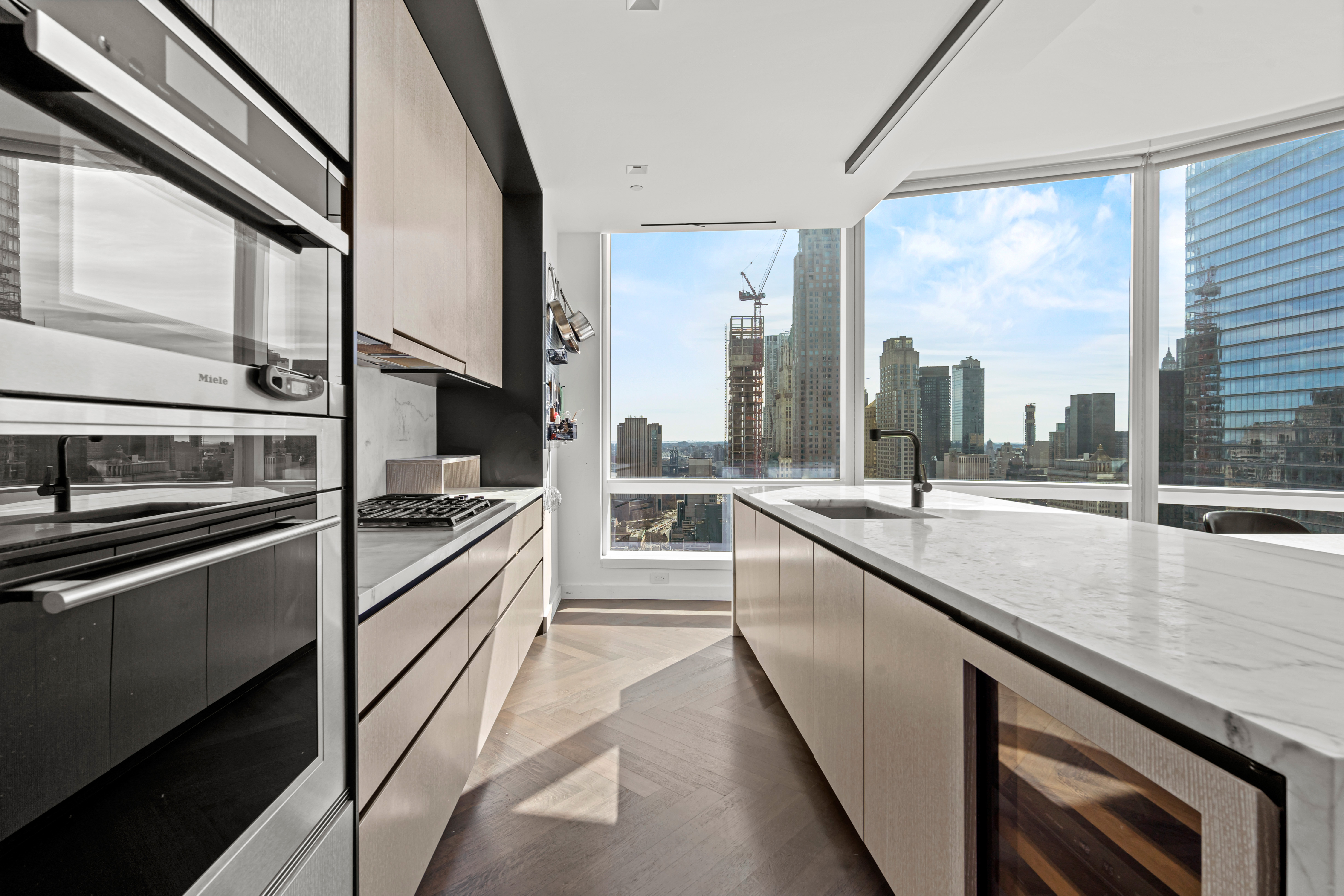 111 Murray Street, Unit 43B Manhattan, NY 10007 - Photo 2 of 17 a large kitchen with a large window