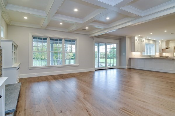 185 Dedham Street Dover, MA 02030 - Photo 8 of 32 an empty room with wooden floor and windows
