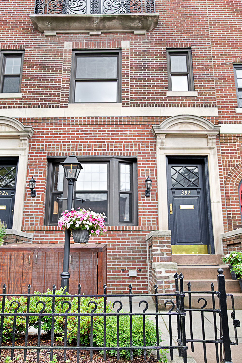 392 9th Street Brooklyn, NY 11215 - Photo 10 of 11 a front view of a house with a garden and plants