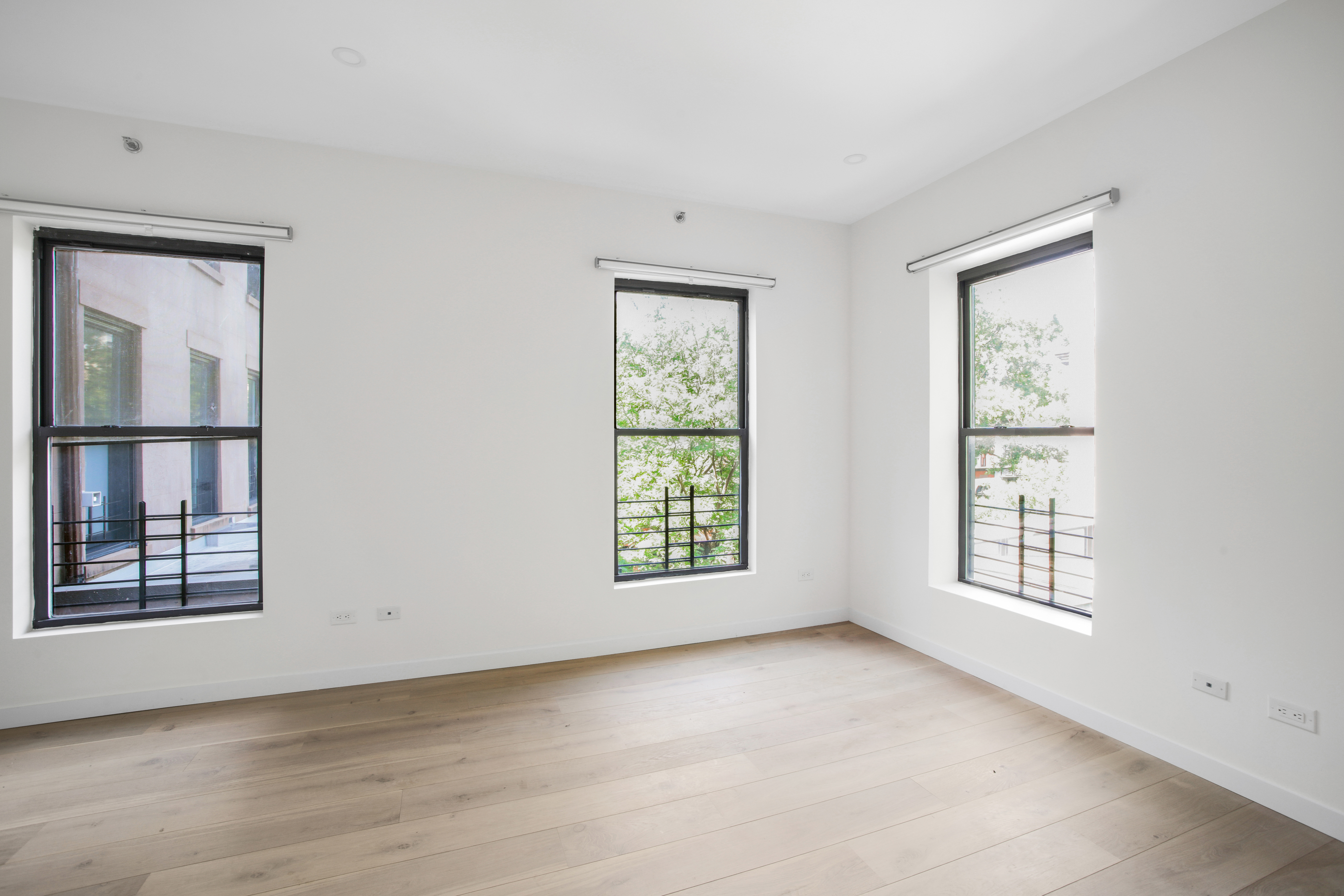 94 6th Avenue, Unit 3R Brooklyn, NY 11217 - Photo 3 of 12 a view of an empty room with a window