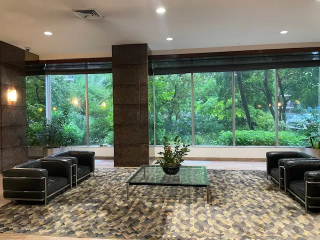 a room with window and pool table