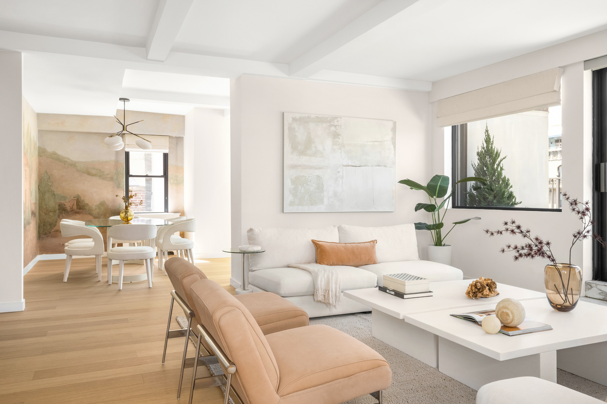 1049 Park Avenue, Unit PH Manhattan, NY 10028 - Photo 3 of 22 a living room with furniture and a large window