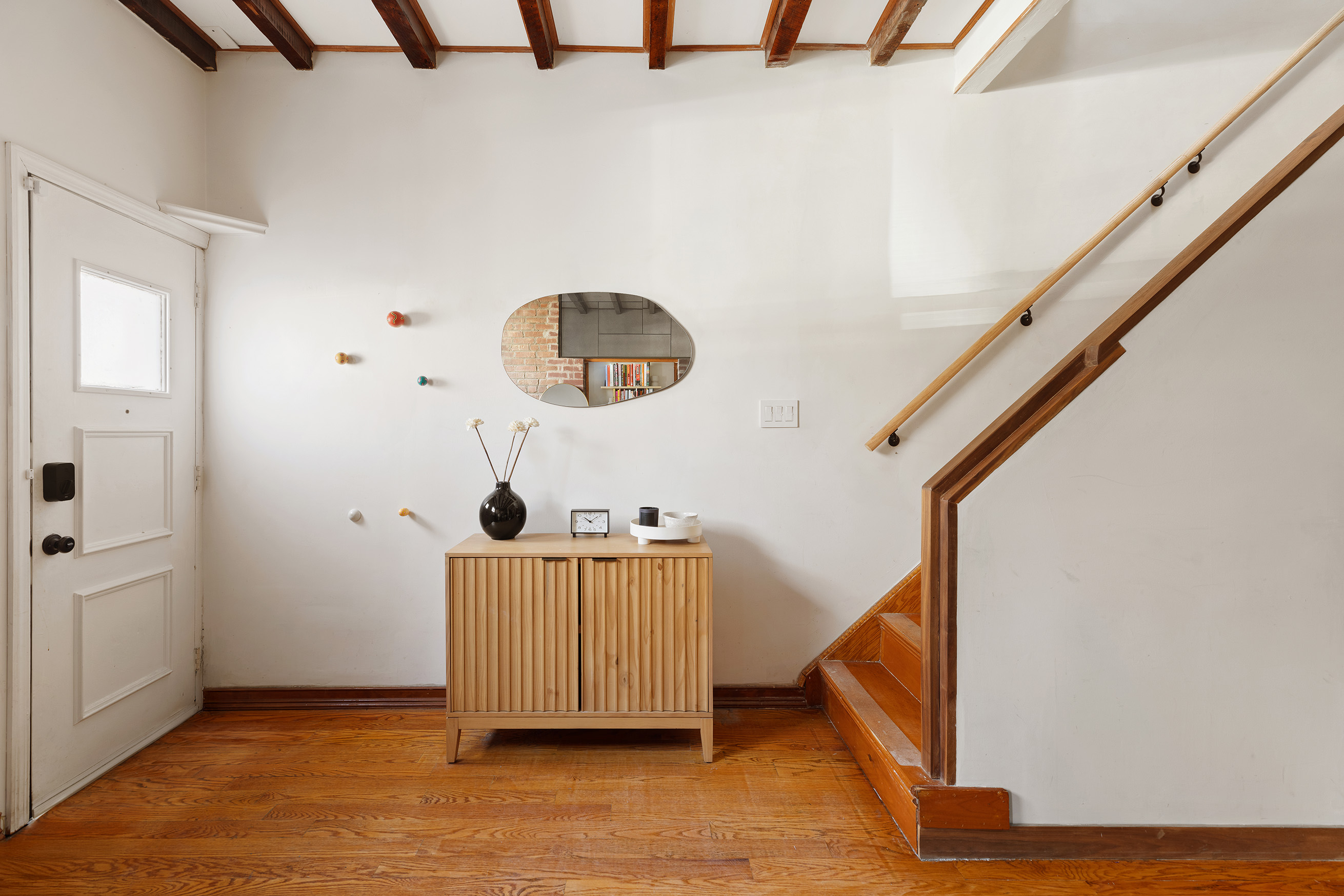 171 Monitor Street Brooklyn, NY 11222 - Photo 6 of 11 a view of entryway with wooden floor