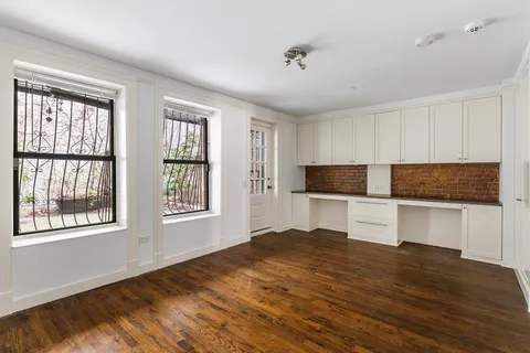 a view of a table and chairs in a city