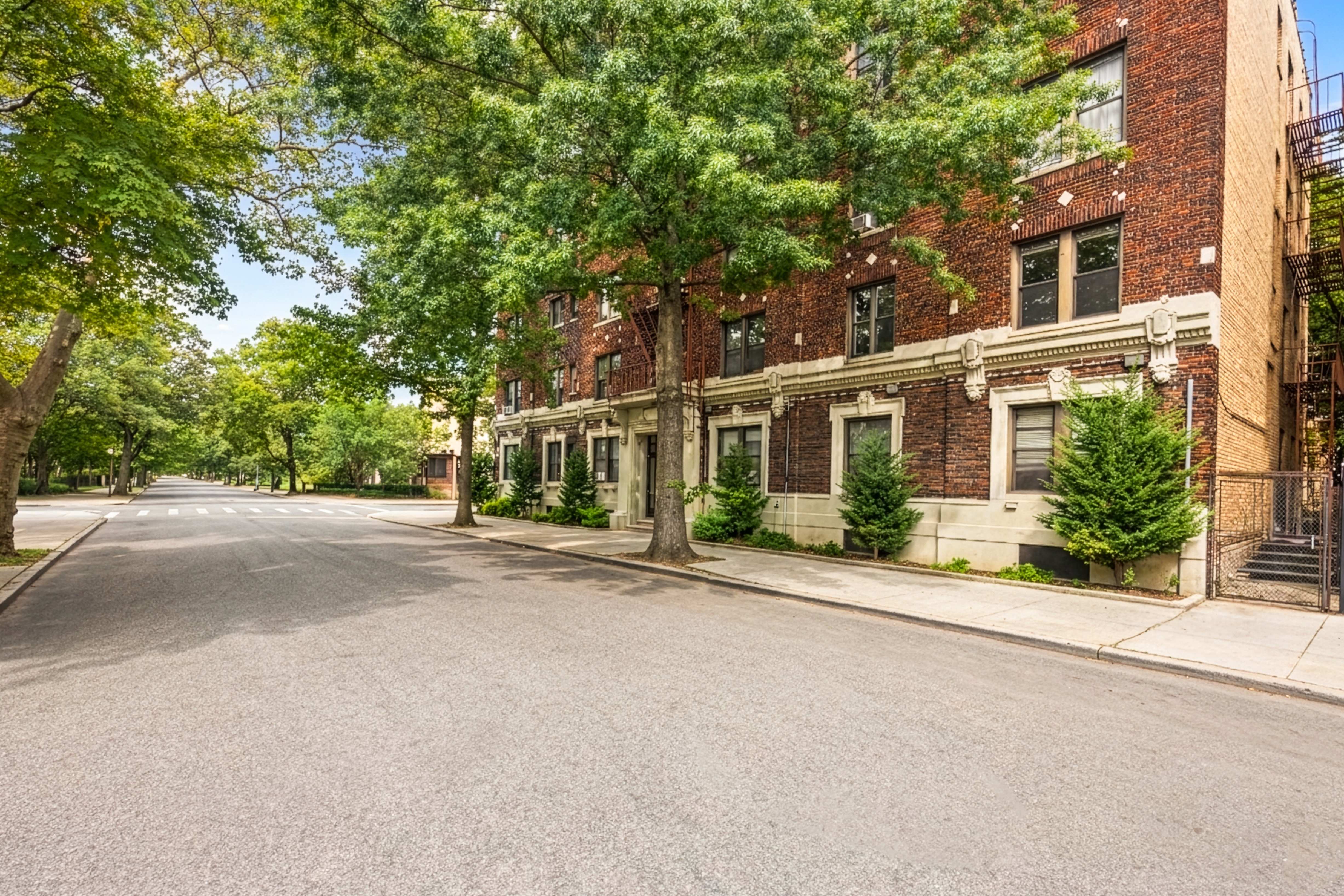 839 East 19th Street, Unit 2D Brooklyn, NY 11230 - Photo 10 of 10 front view of a house with a garden