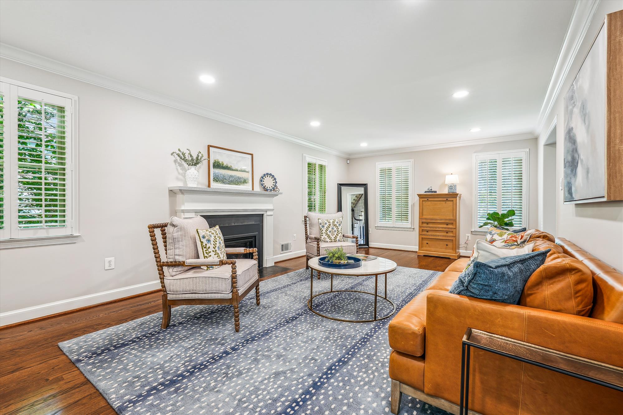 9904 Carter Road Bethesda, MD 20817 - Photo 8 of 41 a living room with furniture and a fireplace