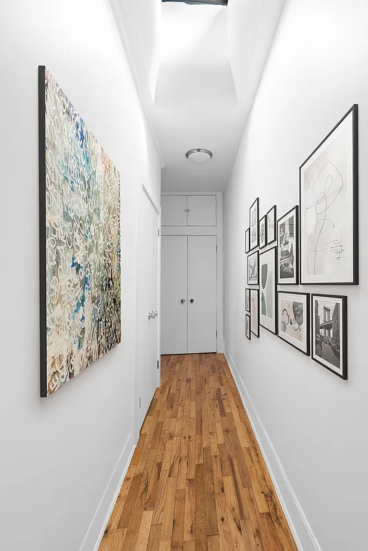 532 10th Street, Unit 1 Brooklyn, NY 11215 - Photo 4 of 6 a view of a hallway with wooden floor
