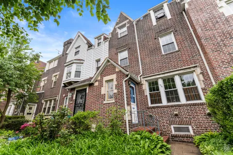 a front view of a multi story residential apartment building