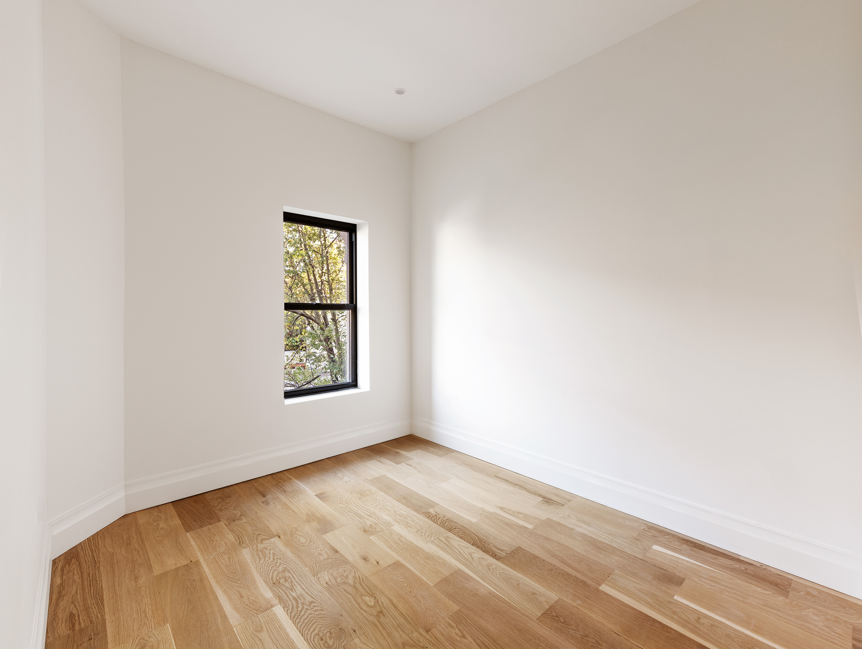 80 7th Avenue, Unit 4 Brooklyn, NY 11217 - Photo 6 of 9 an empty room with a window