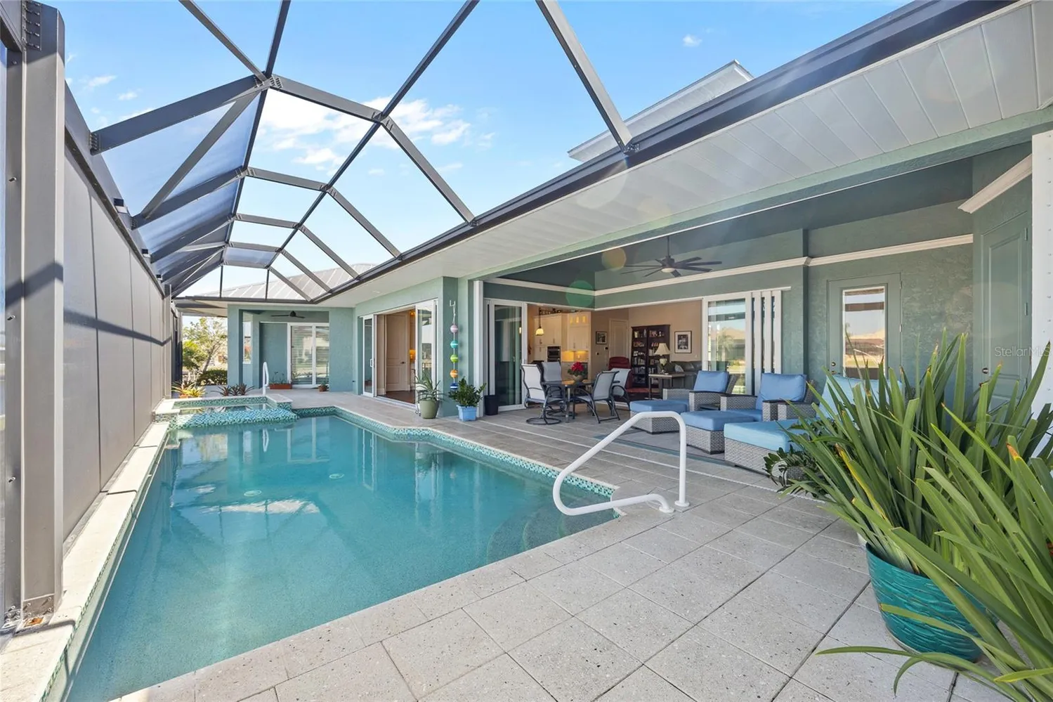 a view of a swimming pool with a patio