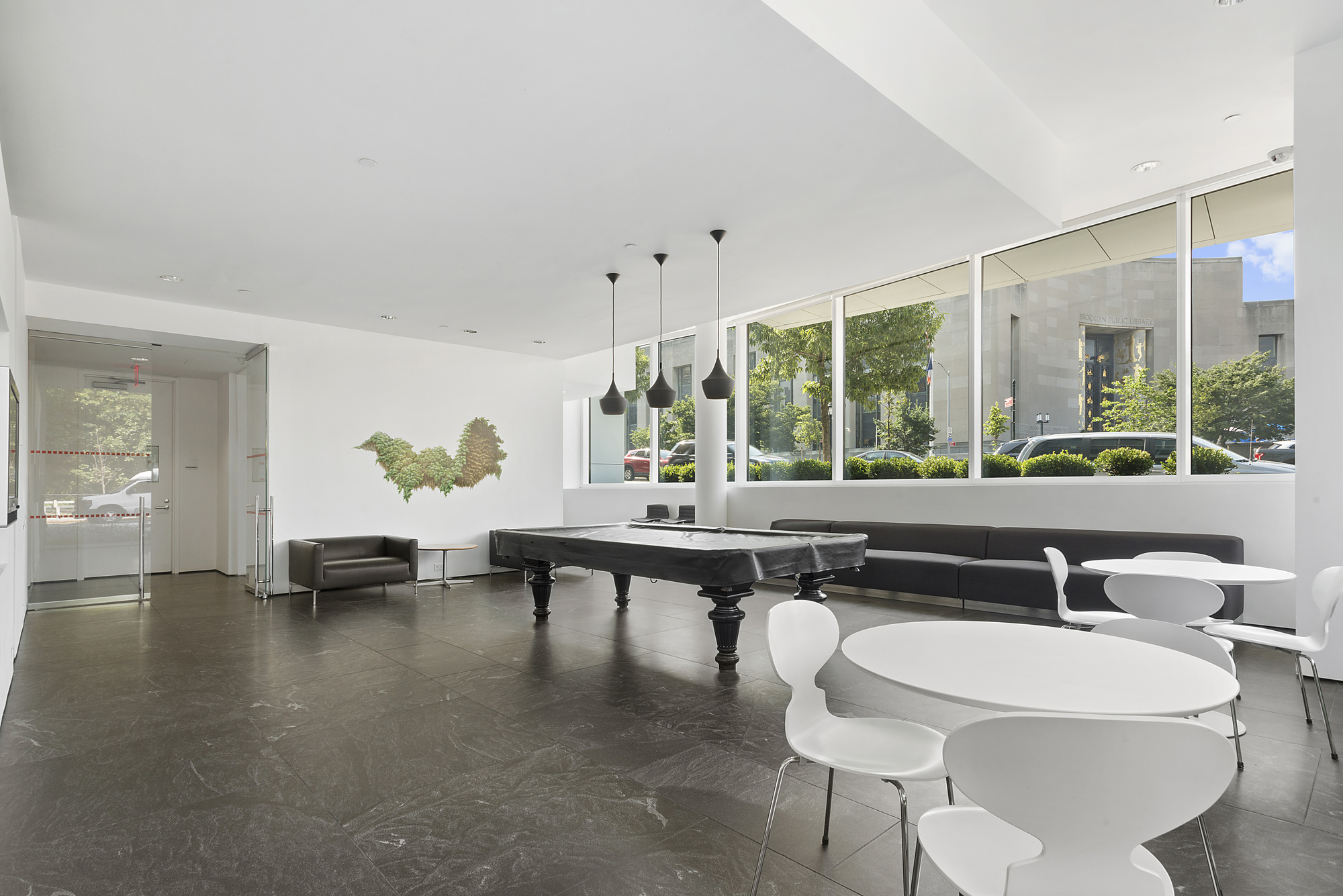 1 Grand Army Plaza, Unit 4B Brooklyn, NY 11238 - Photo 12 of 20 a living room with furniture and a large window