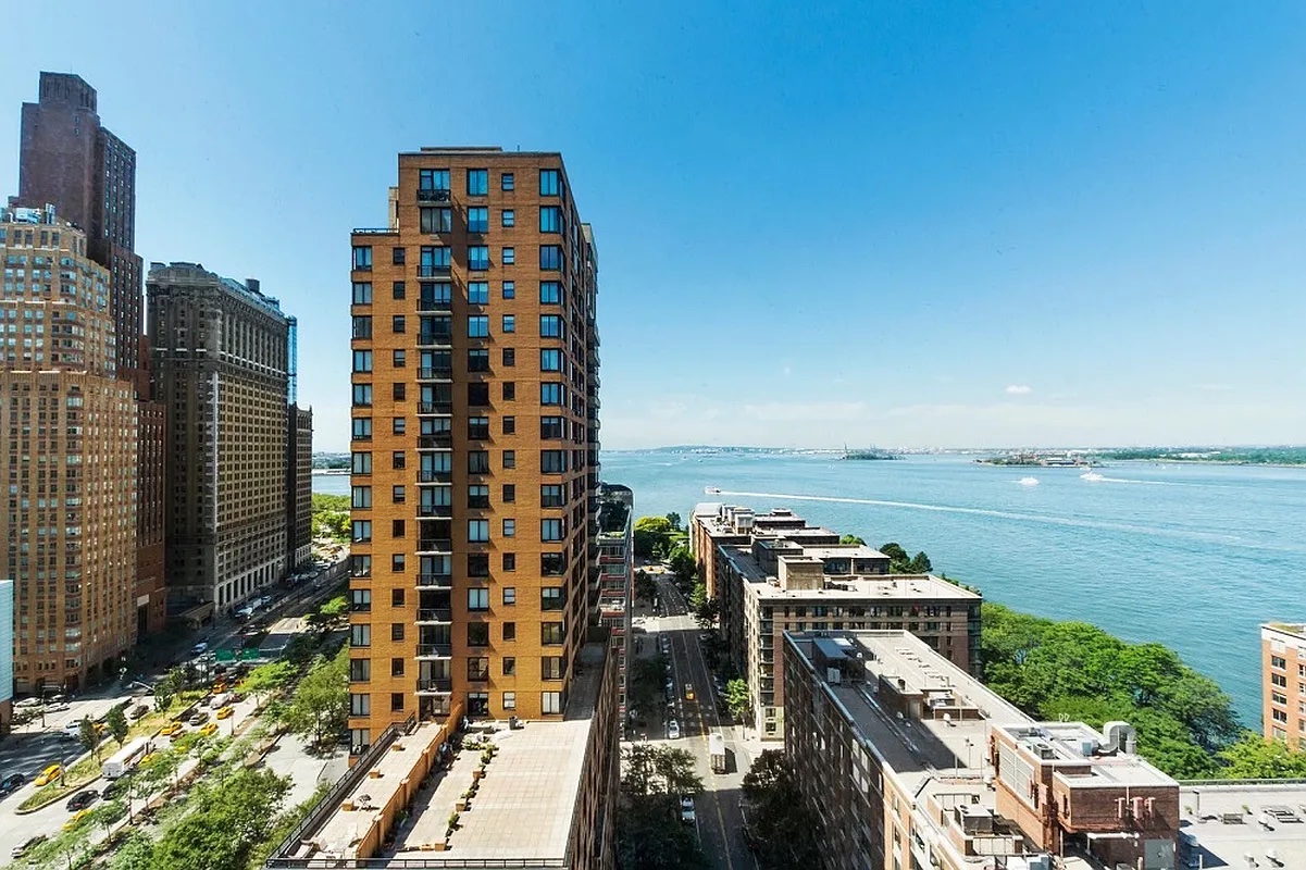 200 Rector Place, Unit 26B Manhattan, NY 10280 - Photo 7 of 8 a view of a city with tall buildings