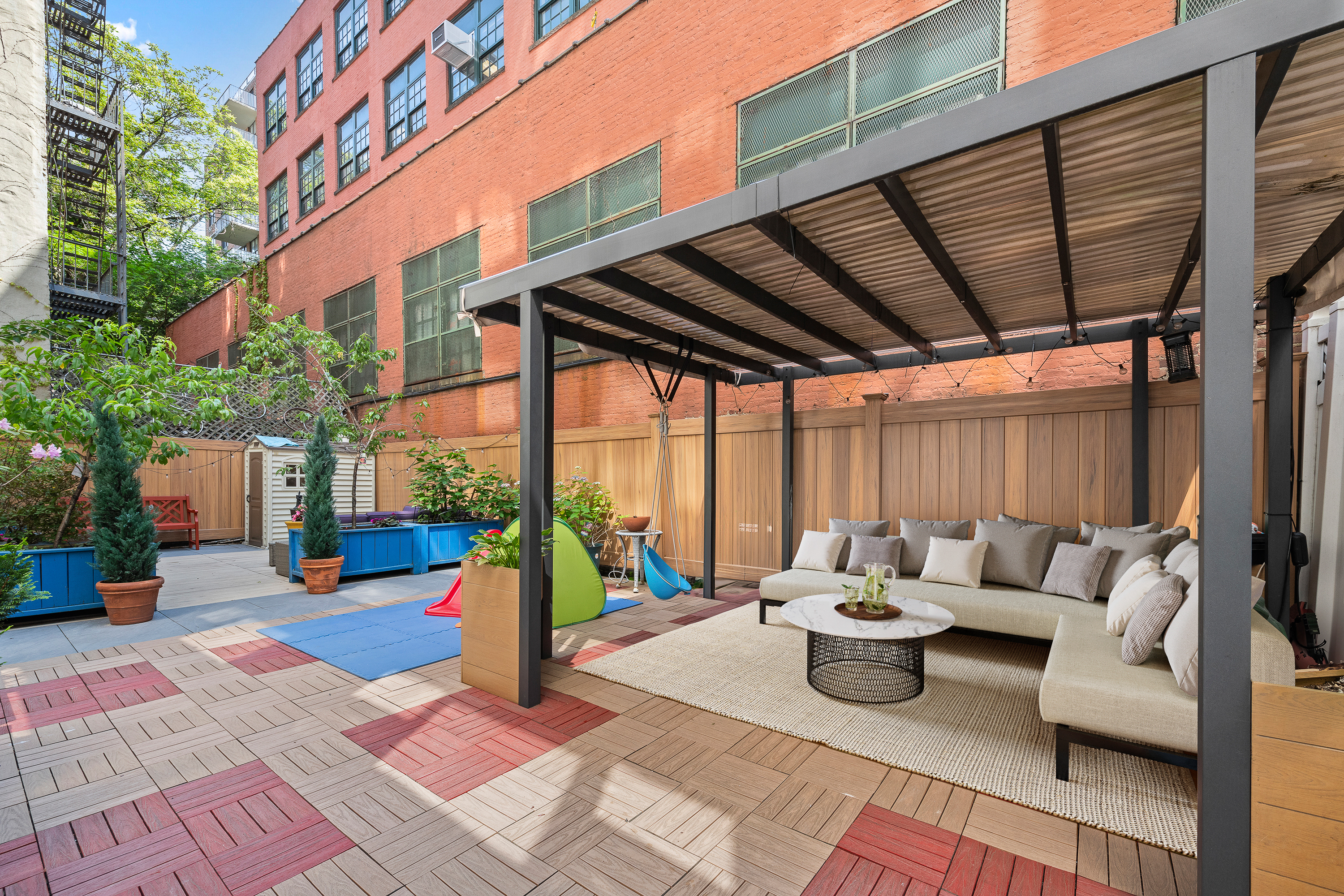 400 East 77th Street, Unit 1CD Manhattan, NY 10075 - Photo 1 of 18 a view of outdoor space with seating